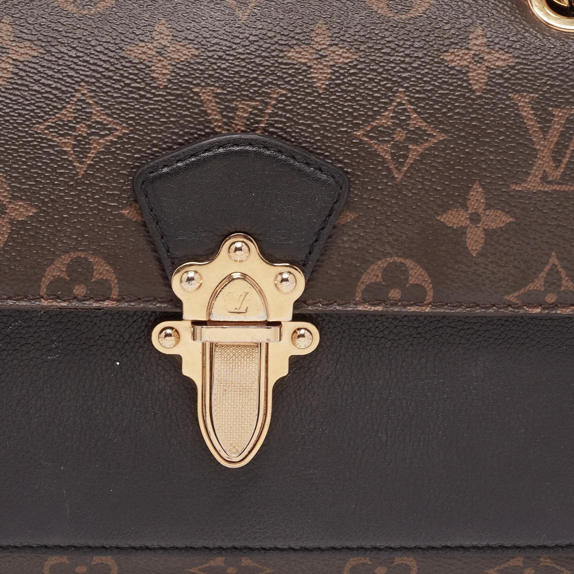 Louis Vuitton Monogram Canvas and Black Leather Victoire Bag In Good Condition In Dubai, Al Qouz 2