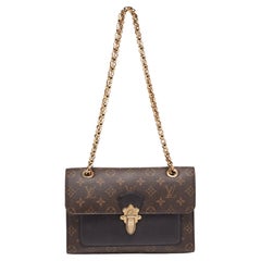 Louis Vuitton - Sac Victoire en toile et cuir noir avec monogramme