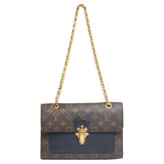 Louis Vuitton - Sac Victoire en toile et cuir noir avec monogramme