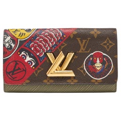 Used Louis Vuitton Monogram Canvas and Epi Leather Kabuki Twist Wallet