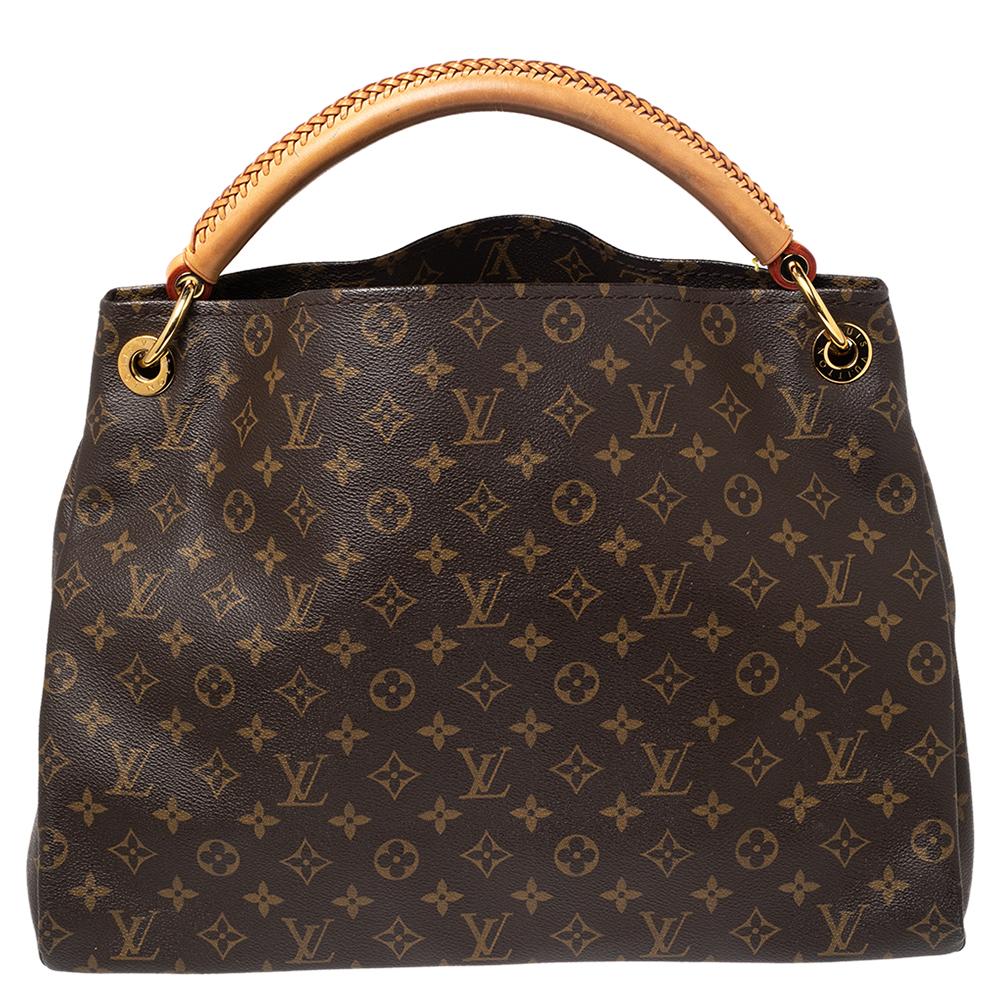 Louis Vuitton Artsy is truly one of a kind. The feminine shape and handcrafted braided leather handle add to its beauty. It comes in the classic monogram canvas and gold-tone hardware. The bag opens to an Alcantara-lined roomy interior and is ideal