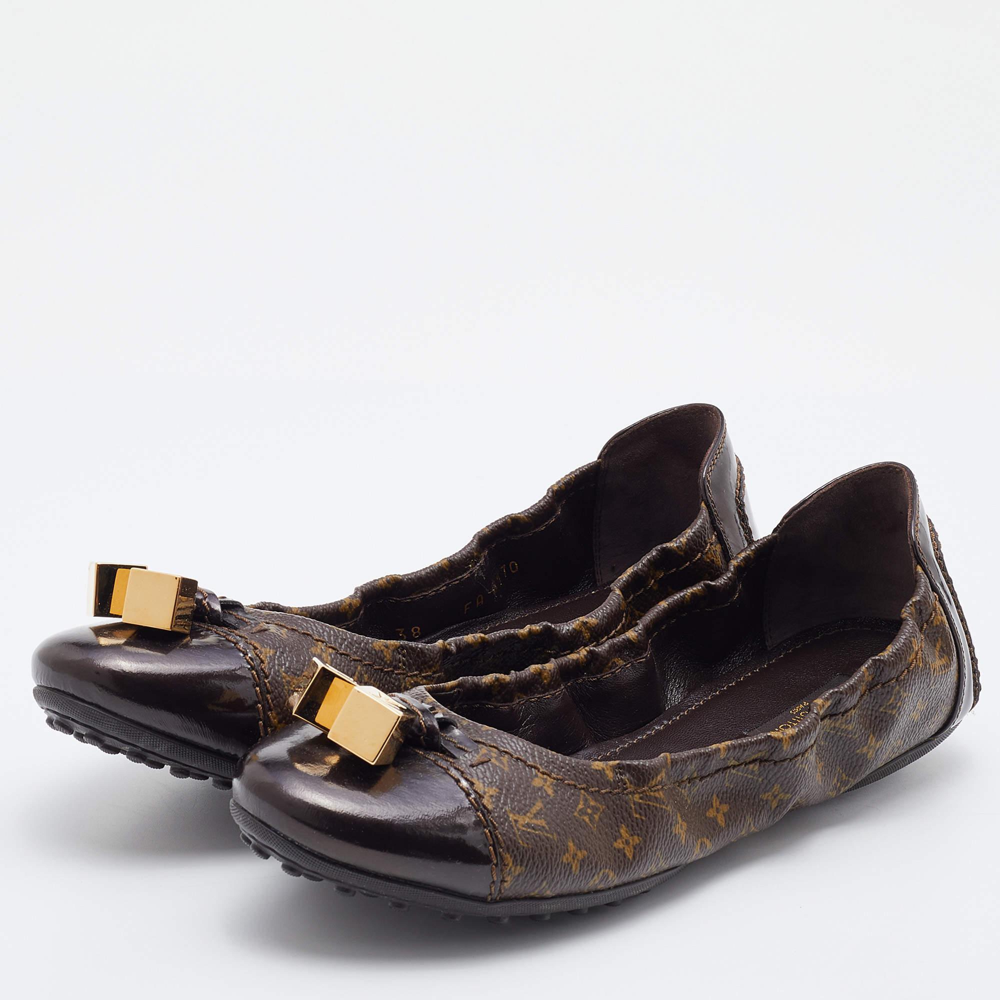 These Louis Vuitton ballet flats are simply elegant and luxe. Crafted from the brown Monogram canvas, they flaunt leather cap toes with 'LV' engraved cubes on them and a scrunched silhouette.

Includes: Original Dustbag