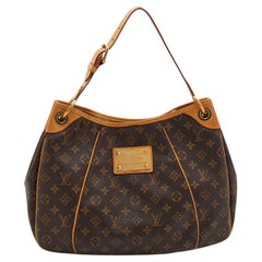 The Louis Vuitton Galliera was released in two sizes: PM and GM. The PM  pictured above measures 15 inches in length.
