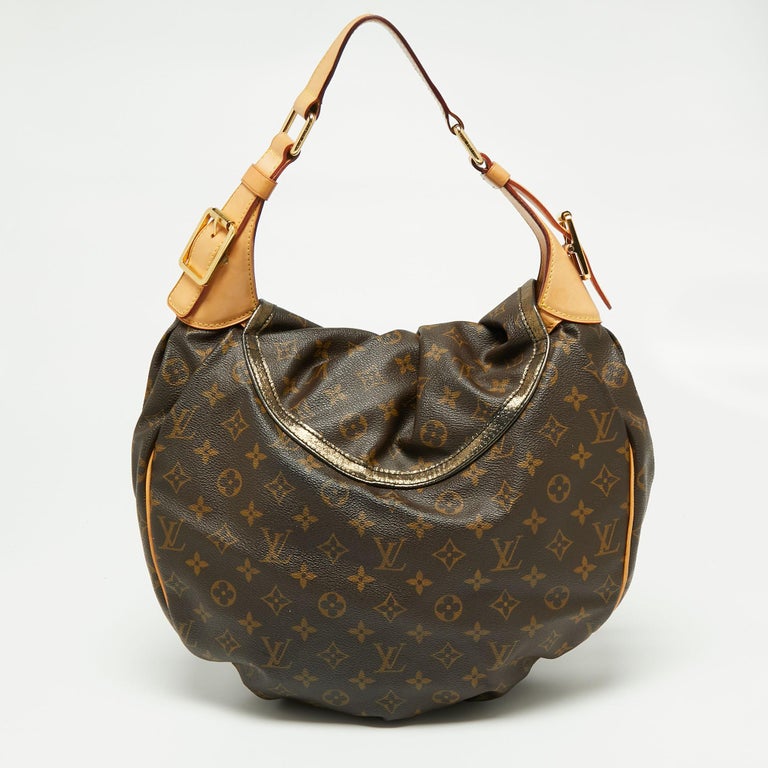 Louis Vuitton Classic Monogram Canvas Kalahari PM Bag .  Luxury