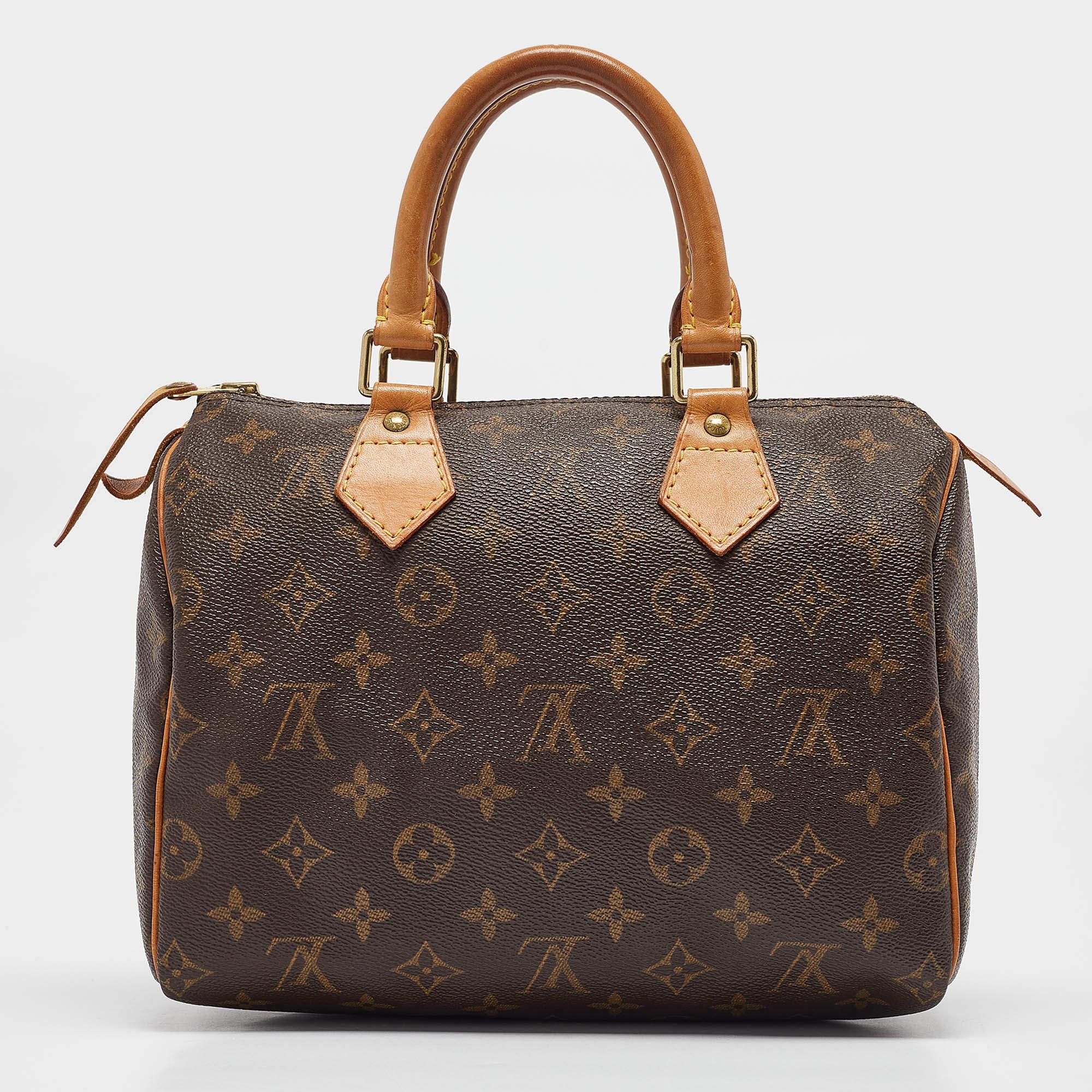 Bolso Louis Vuitton Speedy 25 de lona y piel con monograma en Bueno Estado en Dubai, Al Qouz 2