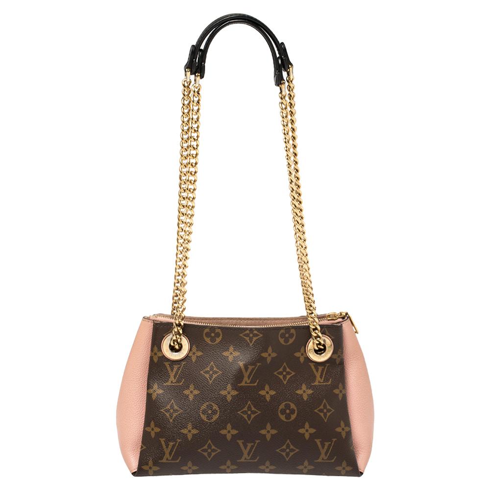 A handbag should not only be good-looking but also functional, just like this Surene BB bag from Louis Vuitton. Crafted from Monogram canvas & leather, this gorgeous number has a spacious Alcantara interior. It features two chain-link handles with