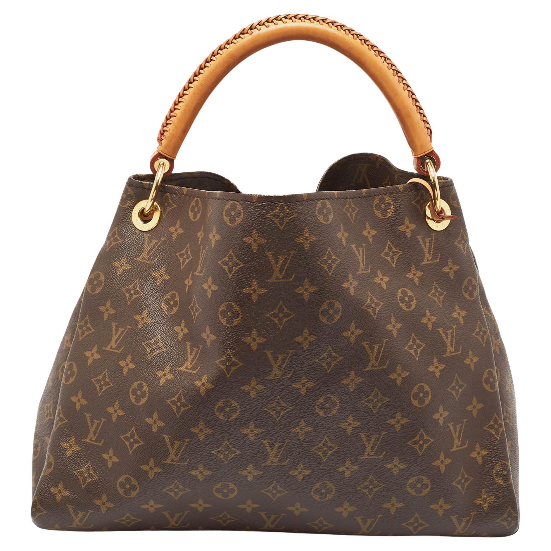 How can you tell if a Louis Vuitton Artsy bag is real?