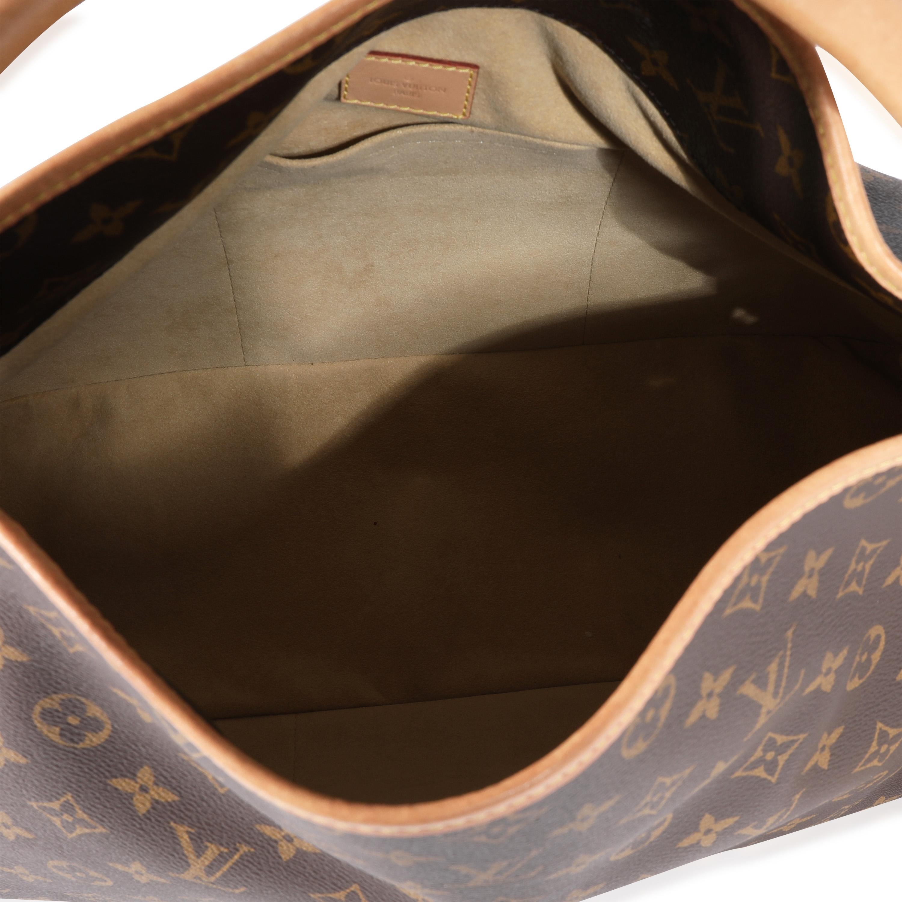 Listing Title: Louis Vuitton Monogram Canvas Artsy MM
SKU: 122270
MSRP: 2500.00
Condition: Pre-owned 
Handbag Condition: Very Good
Condition Comments: Very Good Condition. Light patina throughout leather. Plastic at some hardware. Light scuffing at