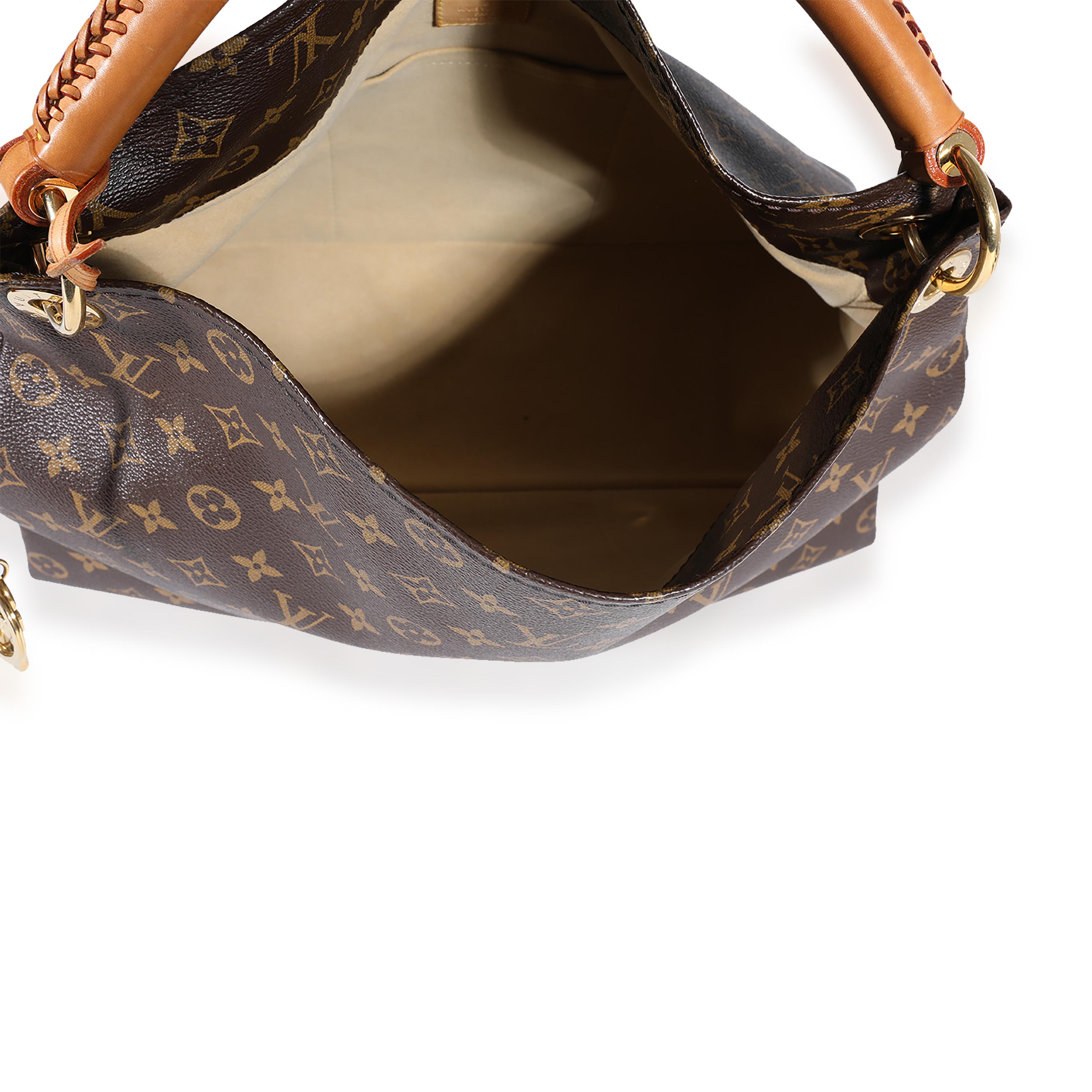 Listing Title: Louis Vuitton Monogram Canvas Artsy MM
SKU: 122516
MSRP: 2500.00
Condition: Pre-owned 
Handbag Condition: Very Good
Condition Comments: Very Good Condition. Patina and scuffing to leather. Scratching and tarnishing to hardware. Light
