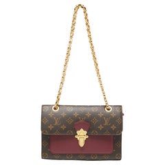 Louis Vuitton - Sac à chaîne Victoire en toile et cuir Aurore avec monogramme