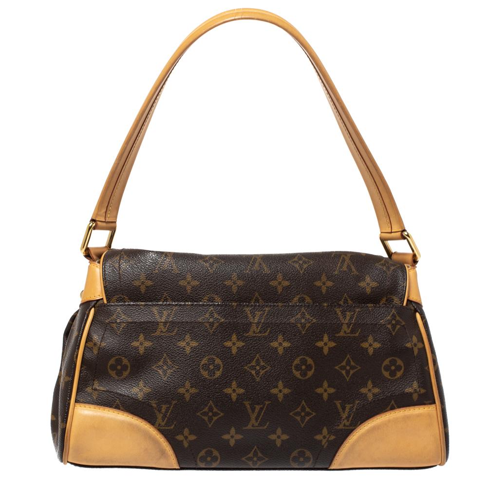 It is every woman's dream to own a Louis Vuitton handbag as appealing as this one. Crafted from their signature Monogram canvas, this bag features two top handles and a flap with a push lock. While the gold-tone hardware elevates its beauty, the