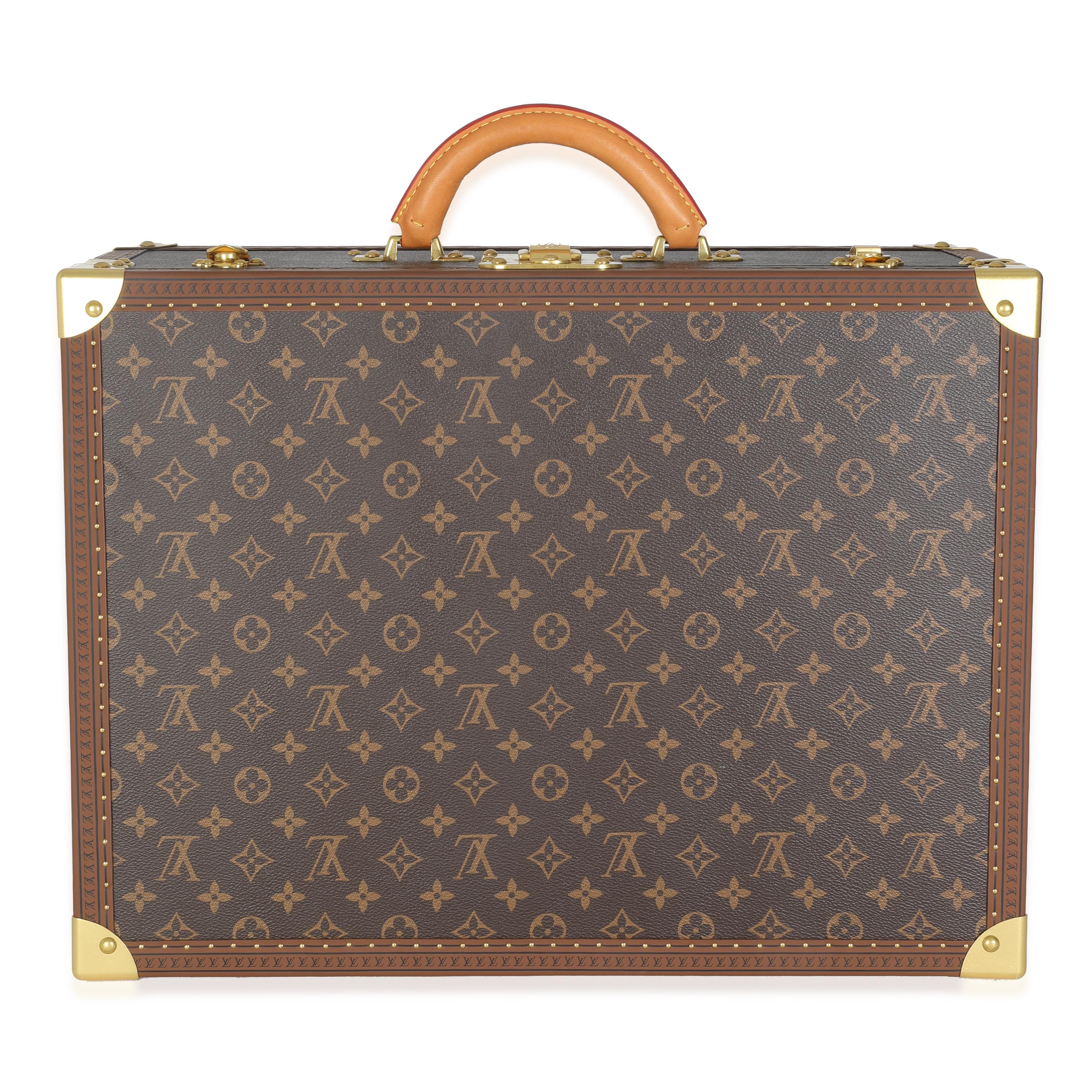 Listing Title: Louis Vuitton Monogram Canvas Bisten 55
SKU: Z147189
MSRP: 9500.00 USD
Condition: Pre-owned 
Handbag Condition: Excellent
Condition Comments: Item is in excellent condition and displays light signs of wear. Please note that a key is