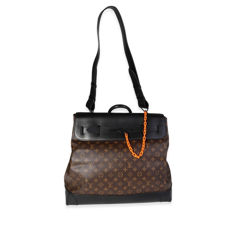 Listing Title: Louis Vuitton Monogram Canvas & Black Leather Solar Ray Steamer Bag
SKU: 120903
Condition: Pre-owned 
Handbag Condition: Excellent
Condition Comments: Odor. Scratches to leather
Brand: Louis Vuitton
Model: Steamer
Origin Country: