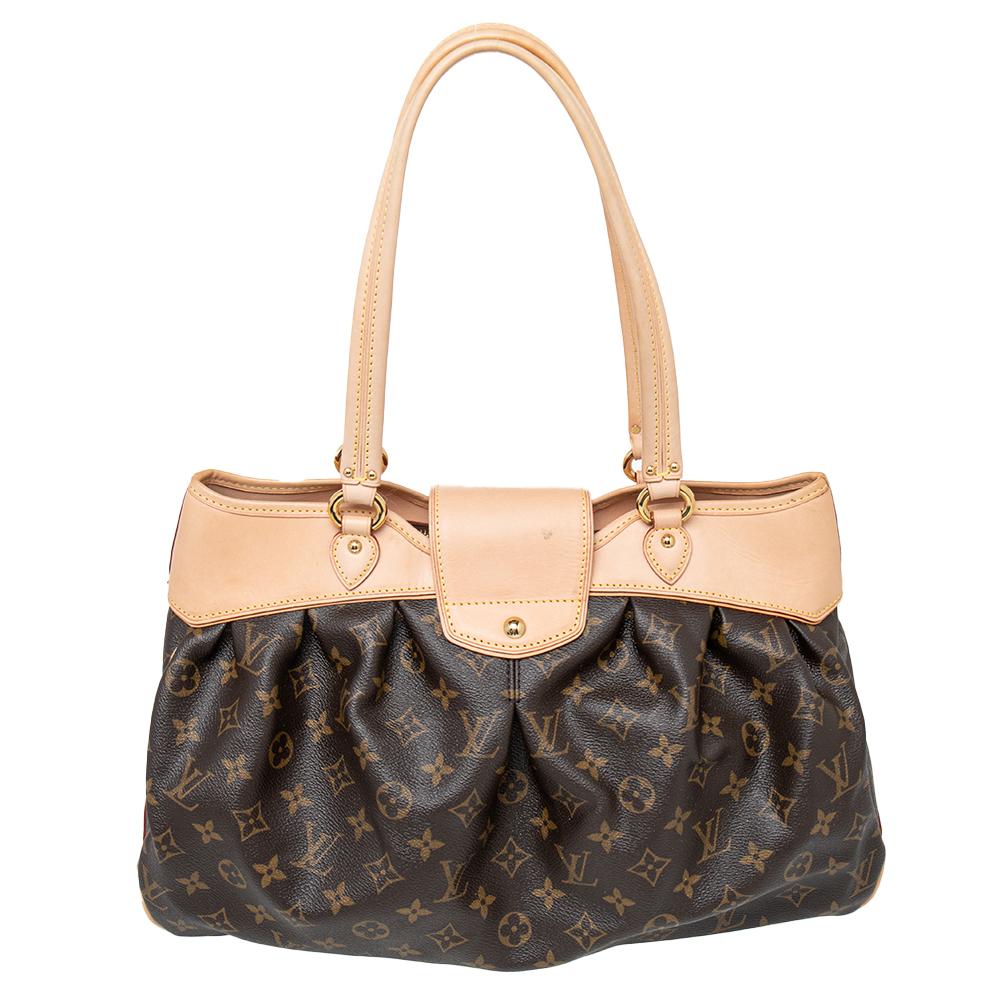 Louis Vuitton is all set to slay the onlookers with this elegant Boetie MM bag. It is designed with the brand's monogrammed canvas and is accented with signature tan leather. It features dual top flat handles making it easy to carry. The front flap