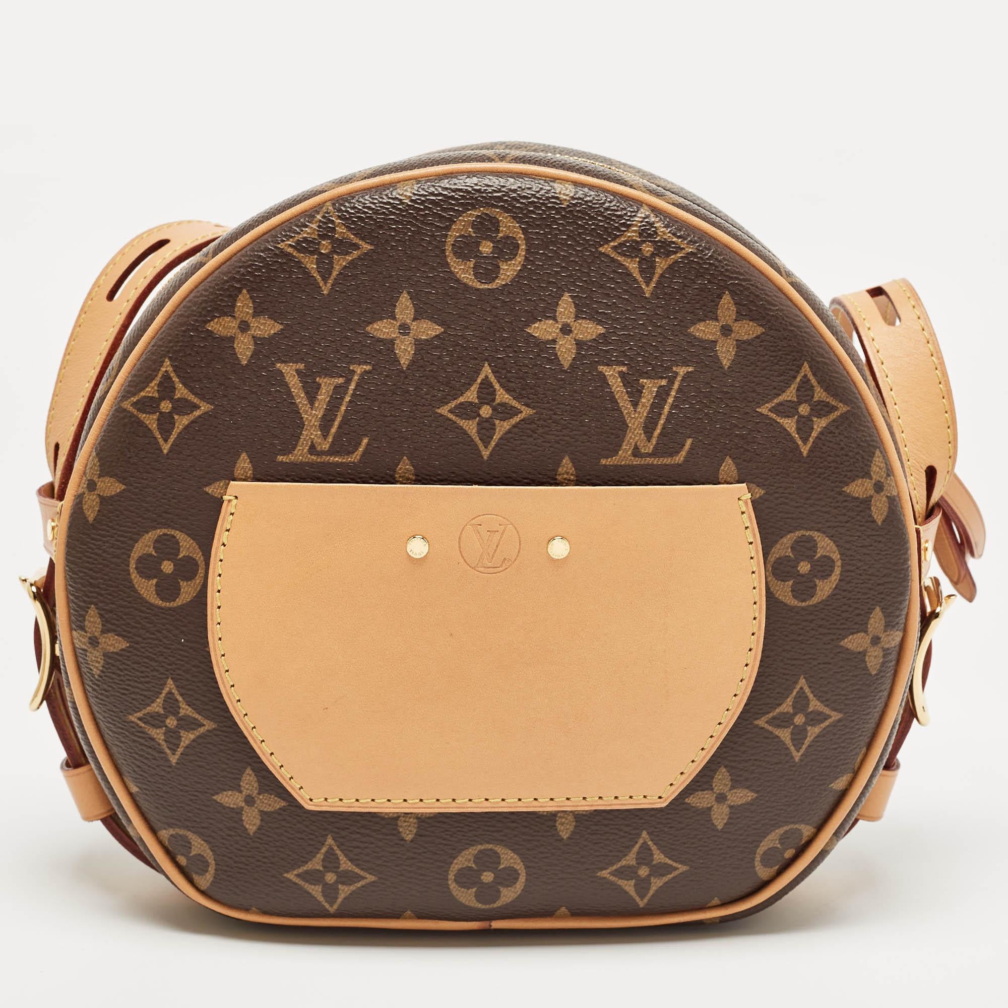 First seen on the Cruise 2018 runway show, Nicolas Ghesquière designed the Boite Chapeau Souple bag as a reimagined version of one of the brand's famous travel bags, the Hatbox. Here, we have the one in monogram canvas and leather, holding the