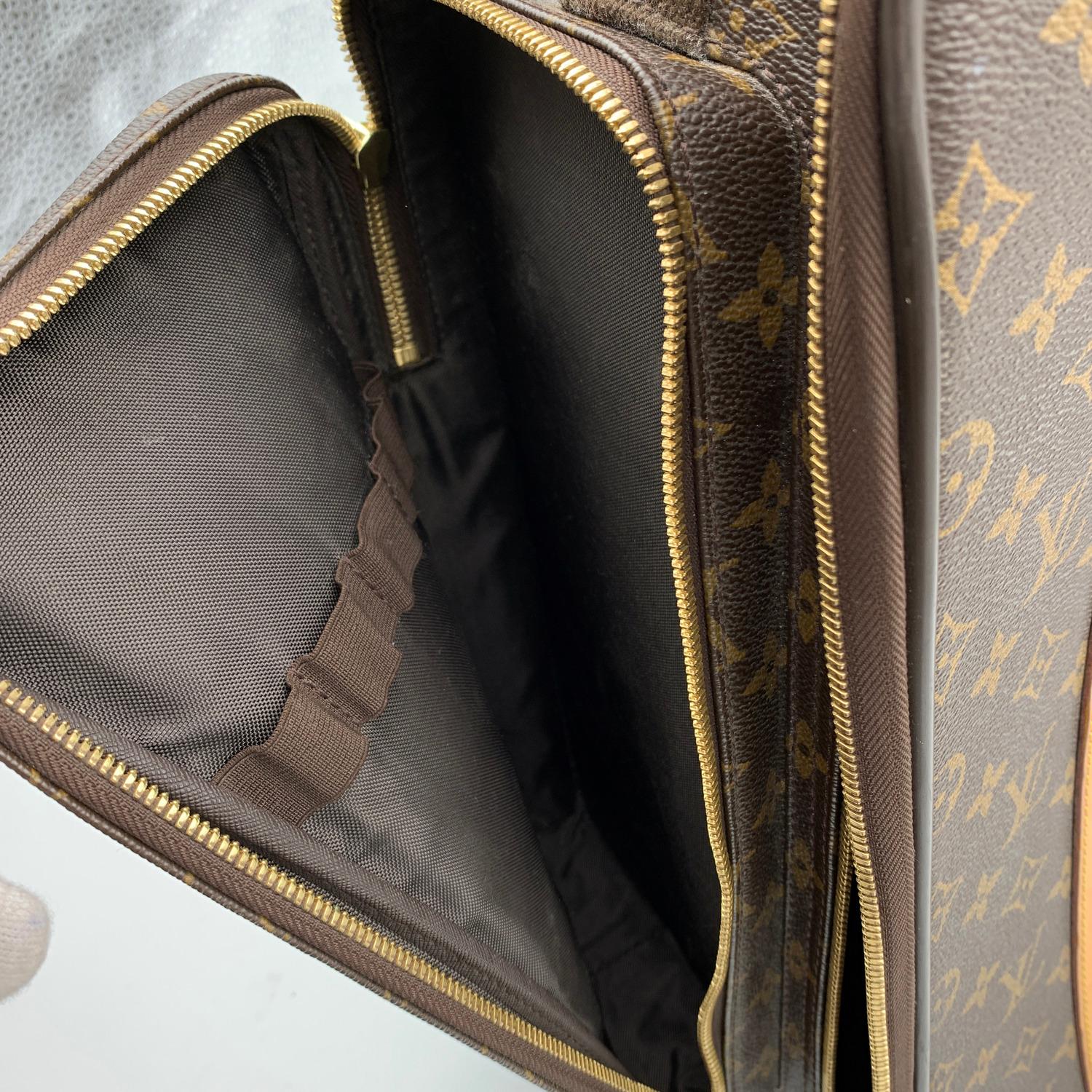 Gorgeous Louis Vuitton Bosphore 50 Roller Luggage. This sophisticated and practical suitcase is crafted in classic monogram canvas and tan leather trim. It features 2 zippered exterior front pockets and 1 side zip pocket, that are easily accessible.