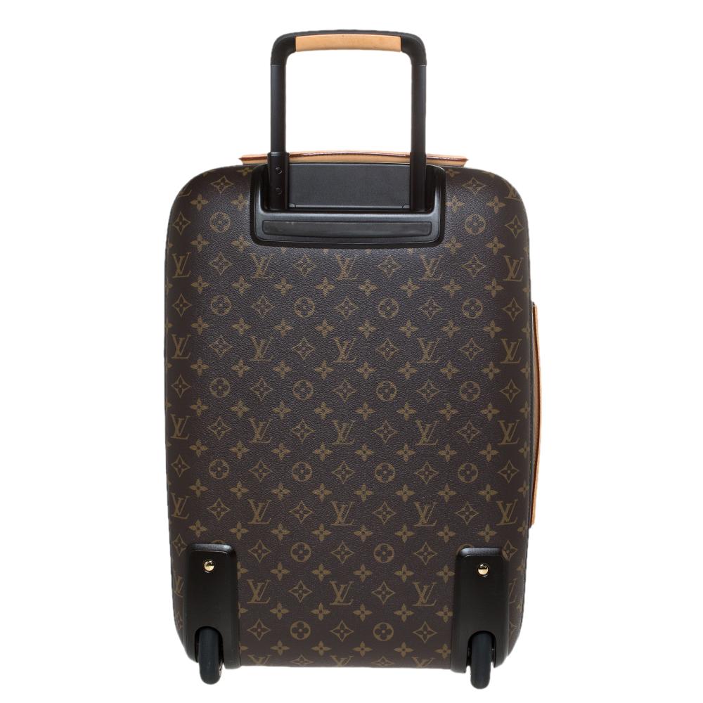 Say hello to your new travelling partner from Louis Vuitton. The exterior has been crafted from monogram coated canvas while the spacious interior is lined with nylon. Equipped with a zip compartment at the front, sturdy handles, two wheels and a