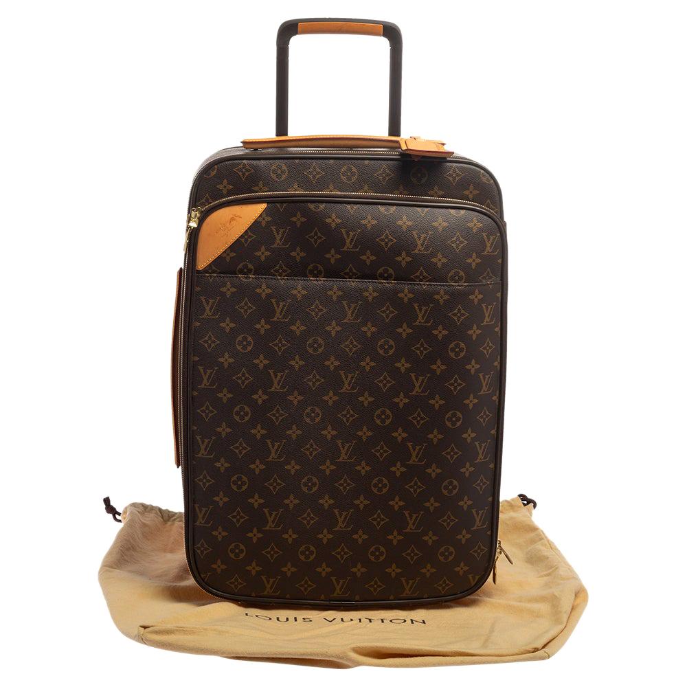 Sold at Auction: A Louis Vuitton Monogram Pegase Suitcase.