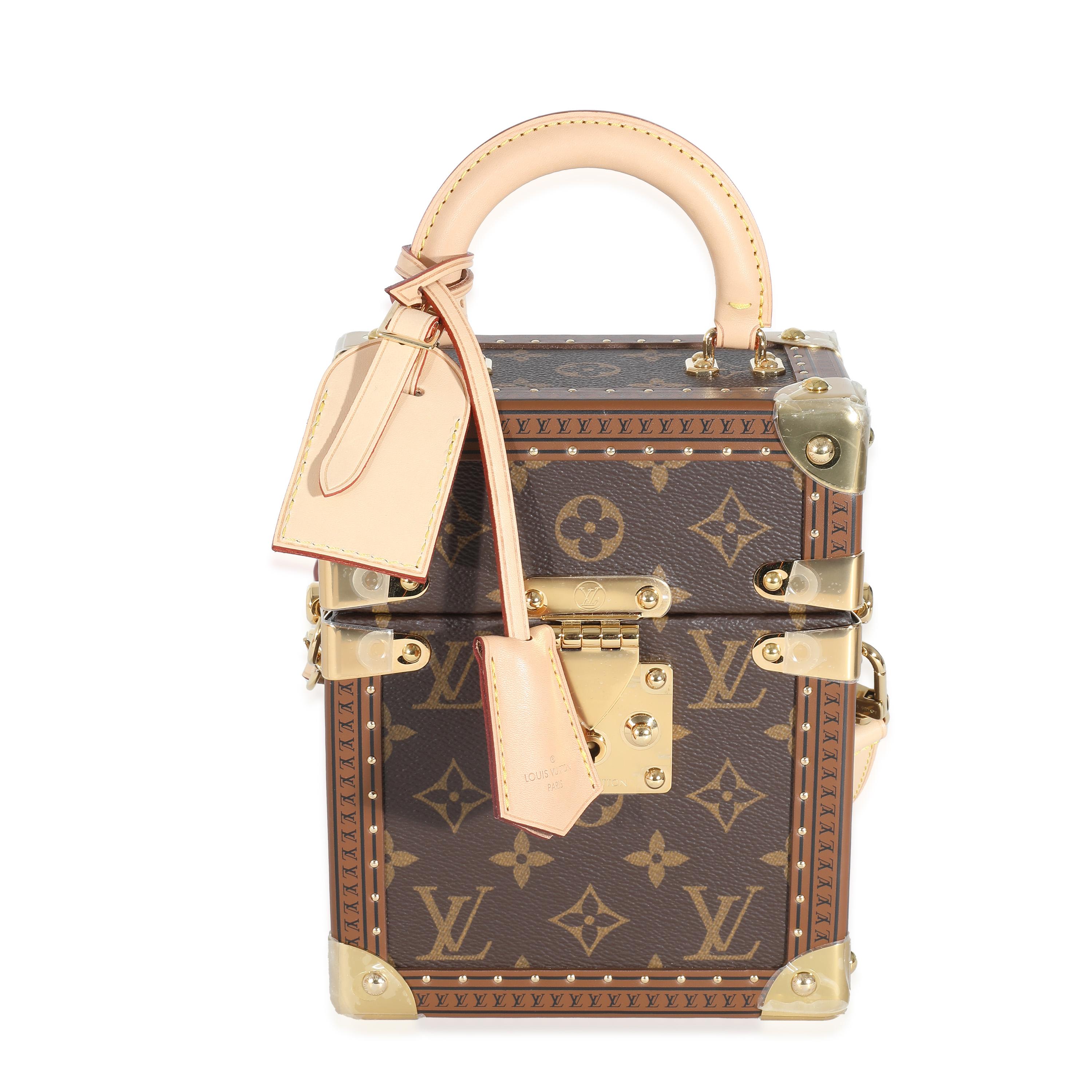 Listing Title: Louis Vuitton Monogram Canvas Camera Box
SKU: 137031
MSRP: 8800.00 USD
Condition: Pre-owned 
Condition Description: Comes with the original box.
Handbag Condition: Excellent
Condition Comments: Item is in excellent condition and