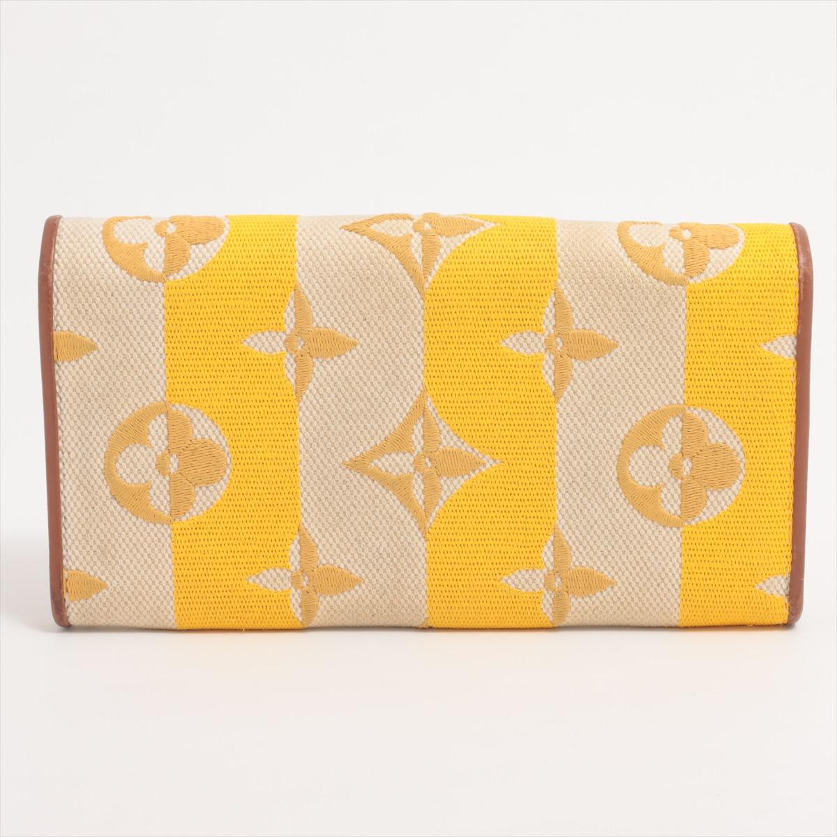 Louis Vuitton Monogram Canvas Capucine Wallet Stripe Yellow Beige In Good Condition For Sale In Indianapolis, IN