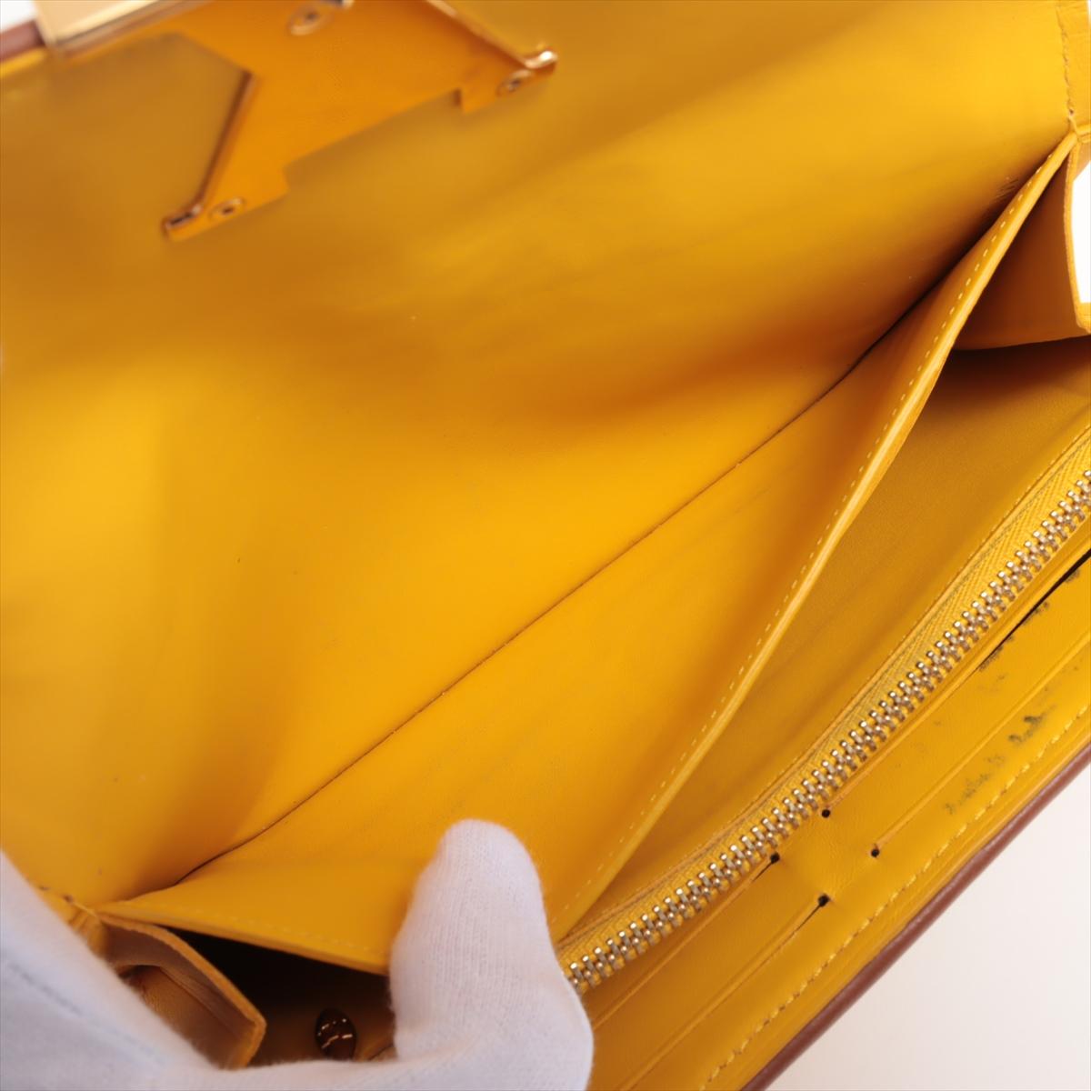 Louis Vuitton Monogram Canvas Capucine Wallet Stripe Yellow Beige For Sale 4