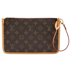 Bolso CarryAll MM Pochette de lona Monogram de Louis Vuitton