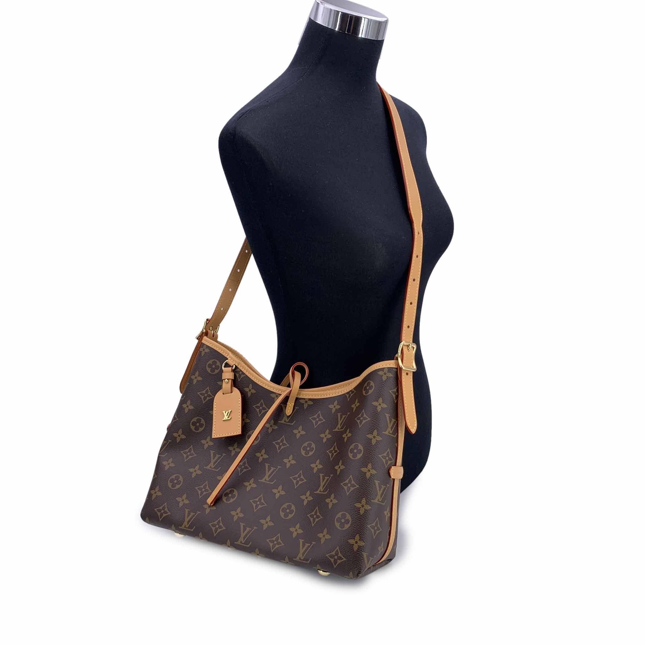 This beautiful item will come with a Certificate of Authenticity provided by Entrupy. The certificate will be provided at no further cost. The Louis Vuitton CarryAll PM bag is the perfect balance of style and practicality, crafted for those who