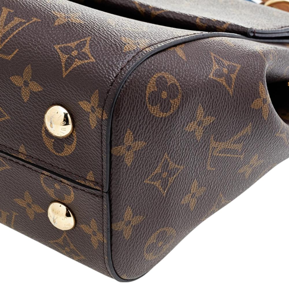 Each bag that comes out of Louis Vuitton's workshops is high on style and craftsmanship, including this beauty. Created from monogram canvas, the Cluny bag has a fine finish. The bag features a top handle, a detachable shoulder strap, protective