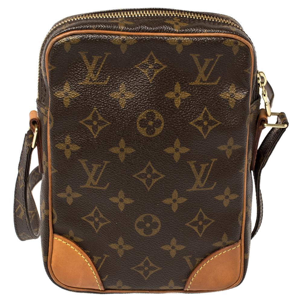 This Danube by Louis Vuitton is perfect for every season. Its well-designed silhouette makes it practical and handy. Formed using monogram coated canvas and accented with leather trims, the bag has a top zipper closure and an adjustable shoulder
