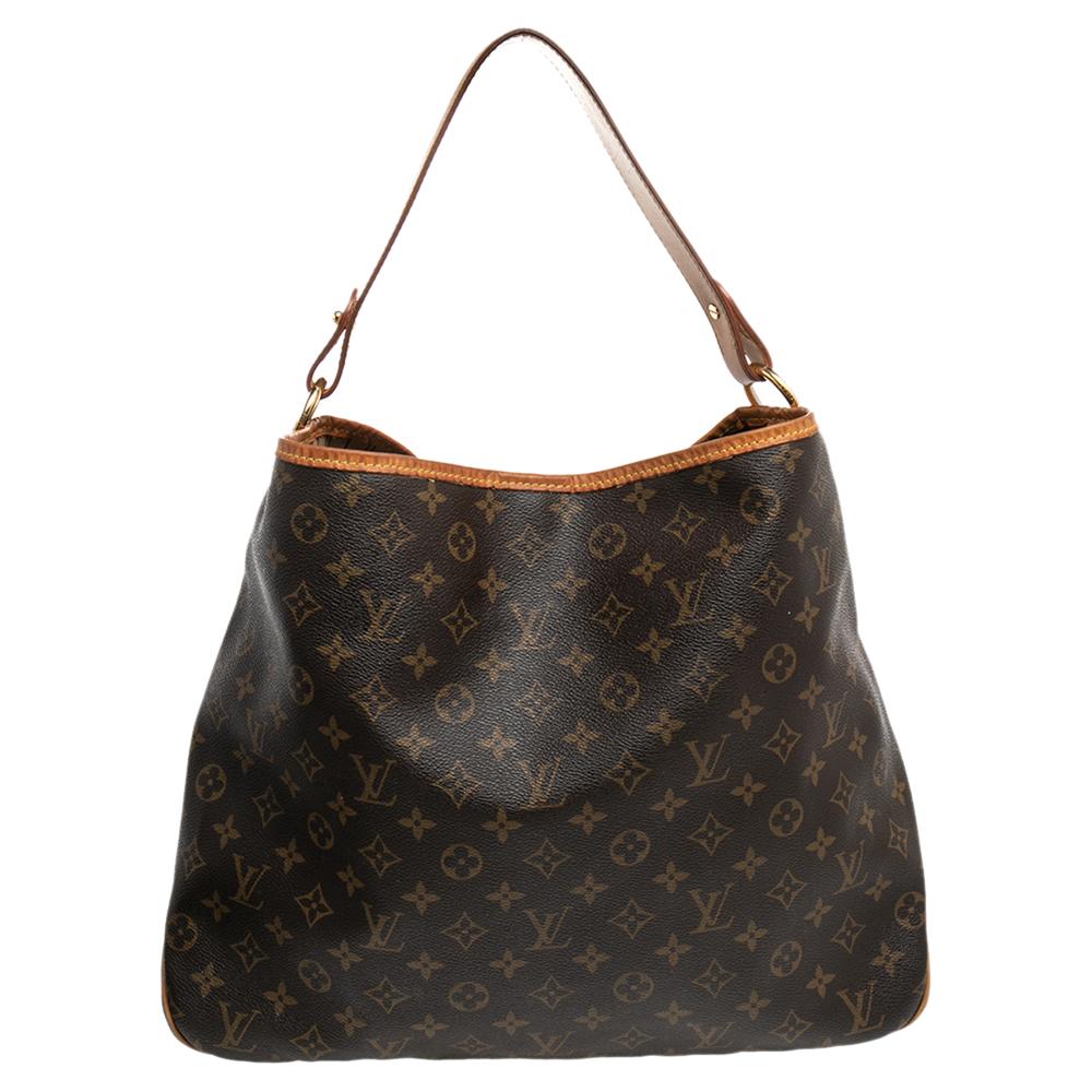 For years, women have leaned towards Louis Vuitton's handbags when it comes to powering their personal style. This Delightful MM Bag, like all the other handbags, is durable and stylish. Crafted from monogram-coated canvas, the bag comes with a