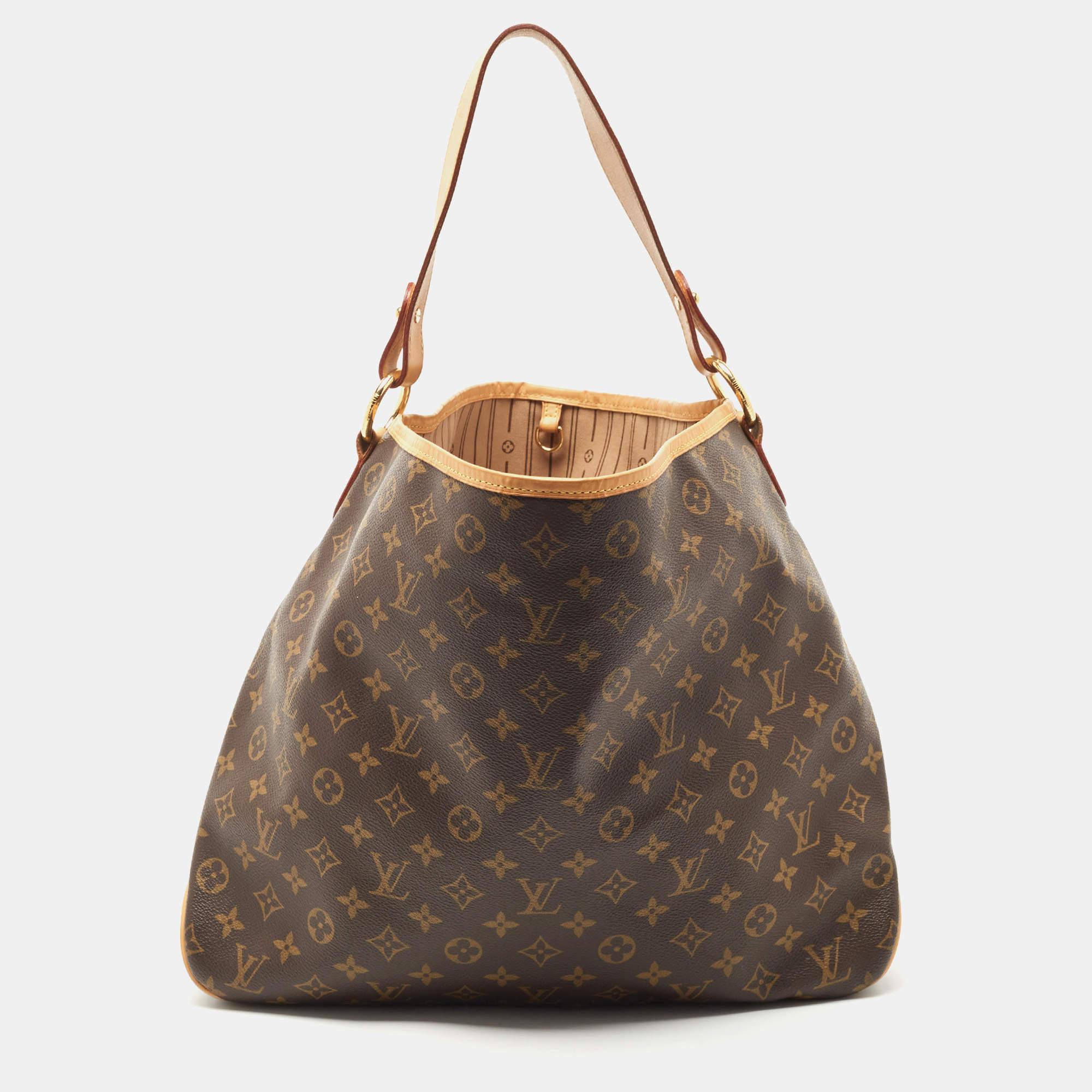 This Delightful MM bag from the House of Louis Vuitton brings you endless style, comfort, and luxury. It is crafted using Monogram canvas and displays gold-tone hardware, a canvas-lined interior, and leather trims.

Includes: Original Dustbag