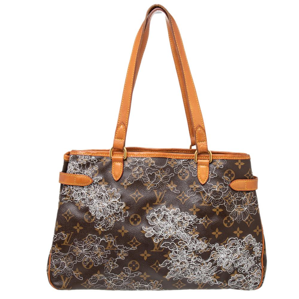 This exclusive Limited Edition Dentelle Batignolles is a must-have for any Louis Vuitton enthusiast. The classic LV monogram canvas features an exquisite lurex lace embroidery design, while the luxurious polished gold-tone hardware, leather trim,