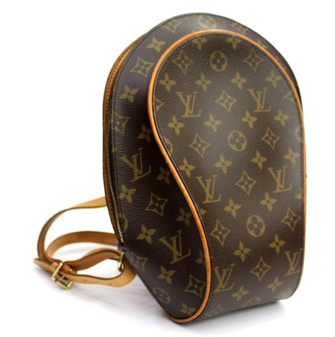 This chic and stylish Louis Vuitton Monogram Canvas Ellipse Sac a Dos Backpack is great for ultimate hands-free convenience. It features a sleek structured design with a spacious interior that will hold all your daily necessities in style. 
