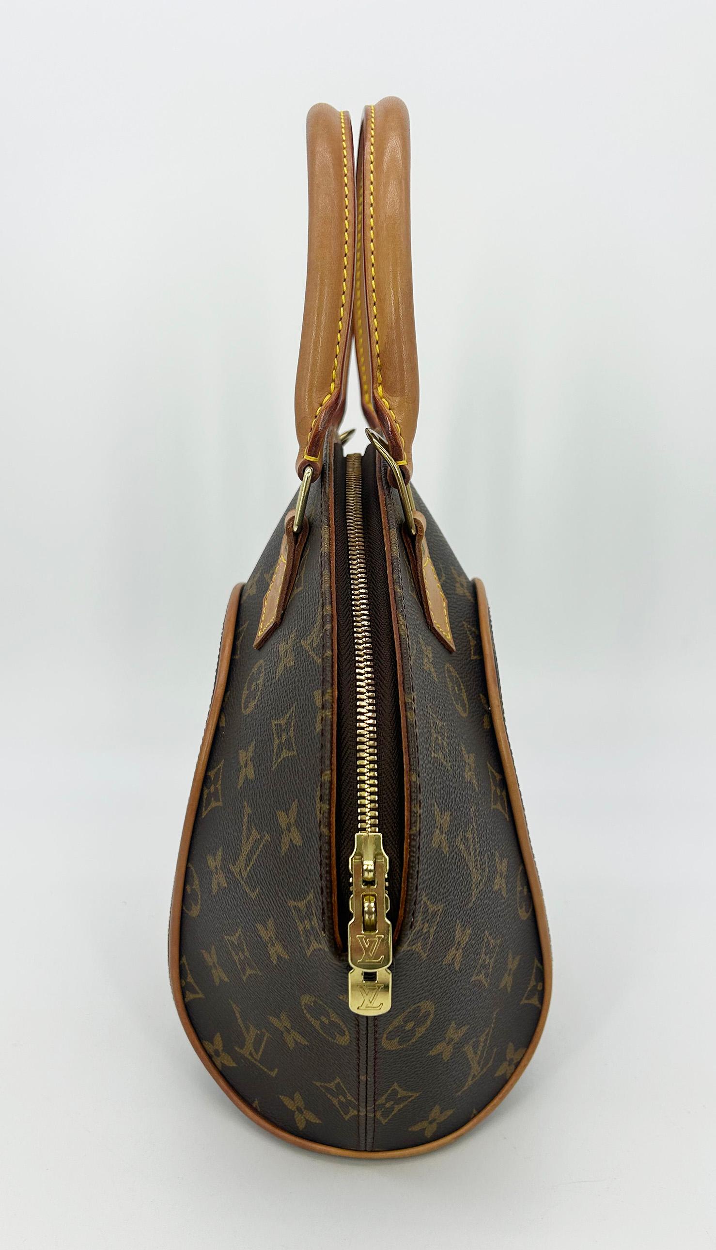 Louis Vuitton Monogram Canvas Ellipse MM in gutem Zustand. Außenseite aus Canvas mit signiertem Monogram in braunem und hellbraunem LV-Druck, eingefasst mit hellbraunen Lederpaspeln, doppelten Tragegriffen und funkelnden goldenen Messingbeschlägen.