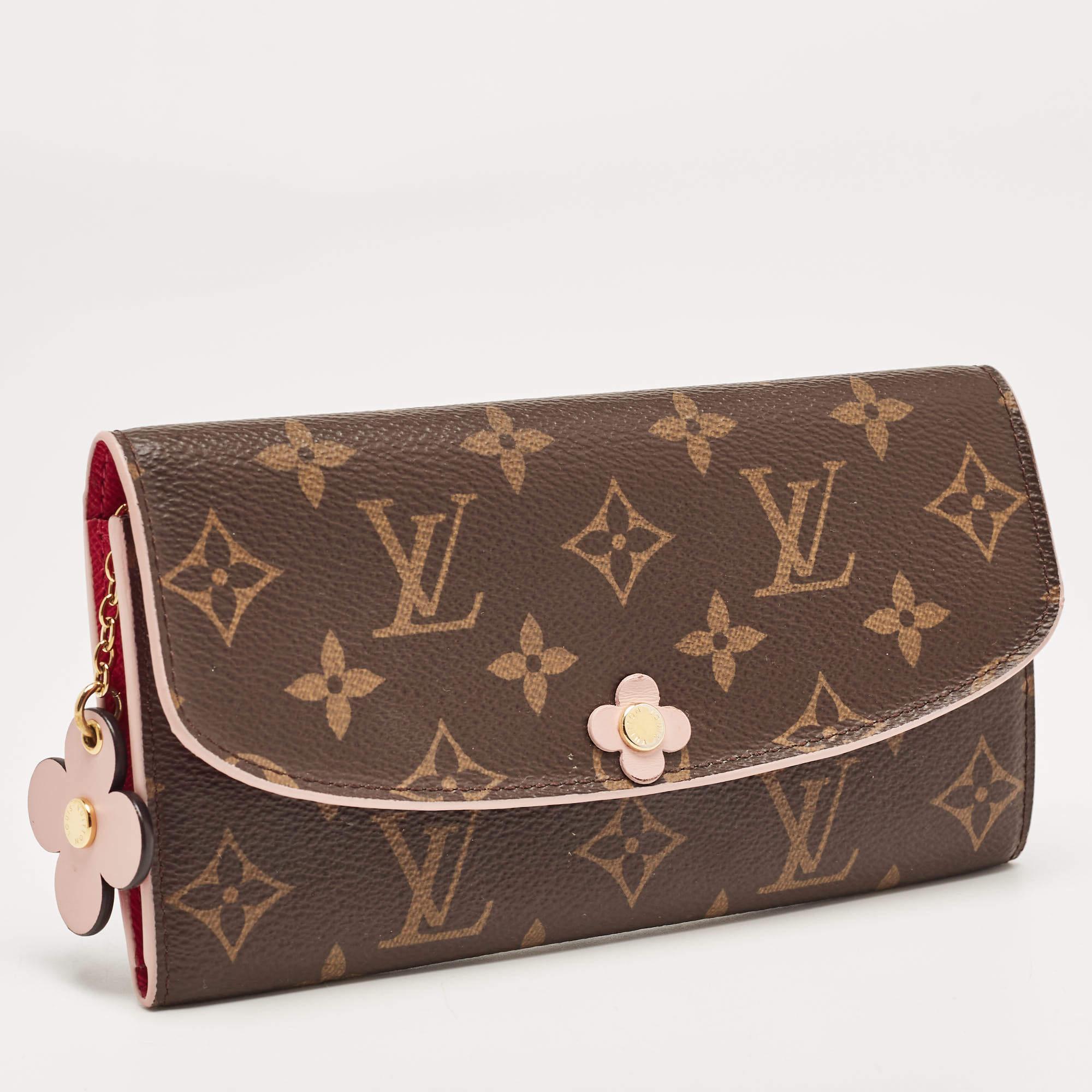 To store all your currencies and cards safely, this Emilie wallet from the House of Louis Vuitton is the best accessory to trust. It is created using Monogram canvas and opens to a leather-lined interior, which consists of neat storage compartments.