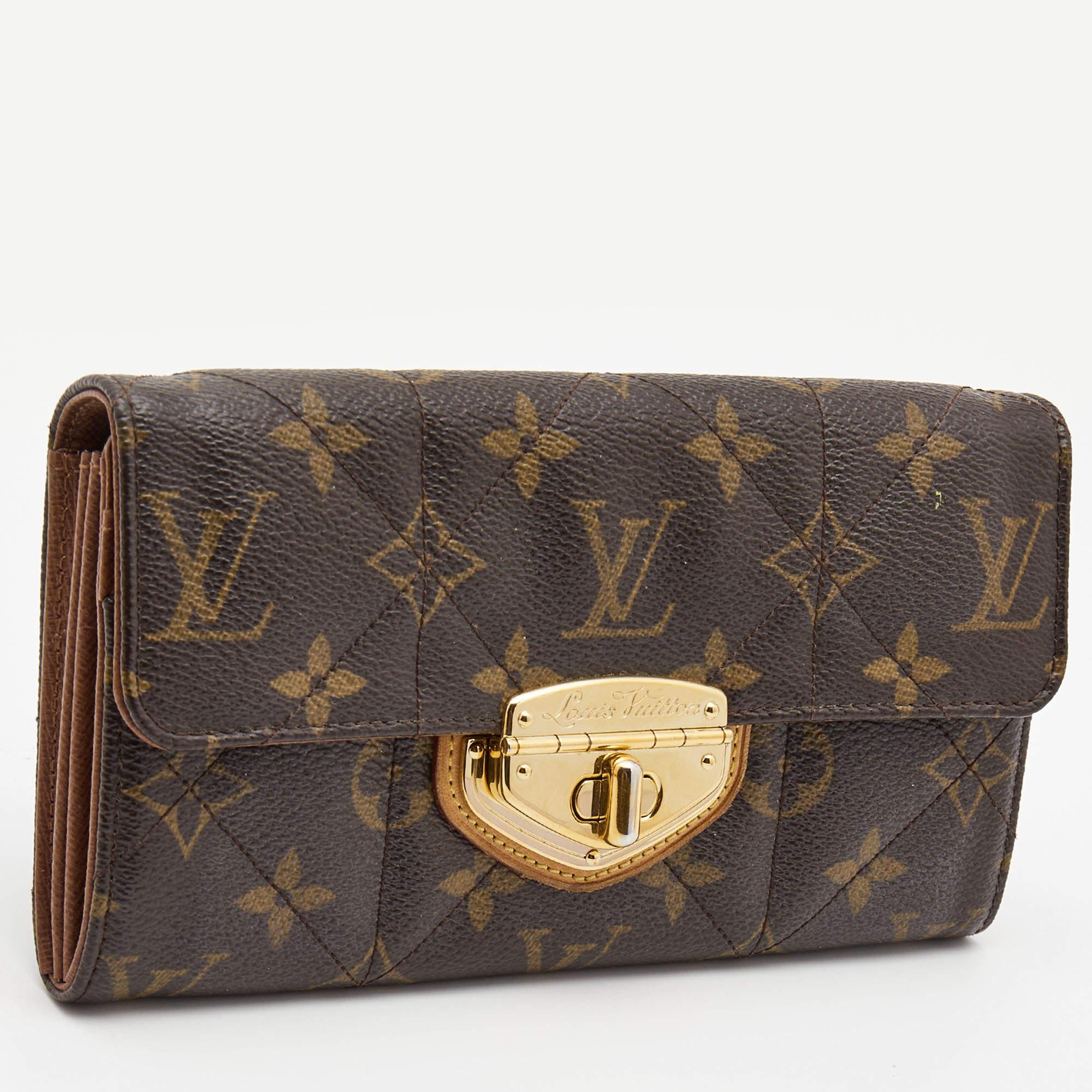 Etoile Sarah is a popular classic wallet by Louis Vuitton. Made from signature Monogram canvas the turn lock closure opens to an expanse with multiple card slots, open compartments to arrange currency and a zip coin pocket. Perfect in size, it can