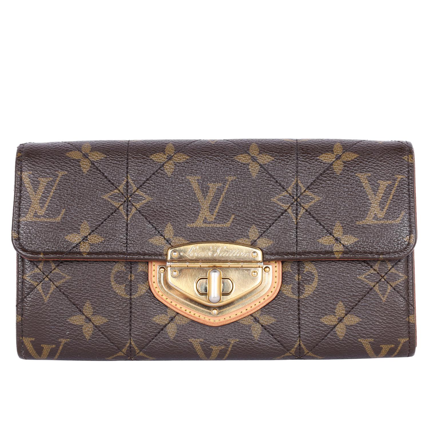 Authentic, pre-loved Louis Vuitton monogram canvas Etoile Sarah wallet. Features soft quilted Louis Vuitton monogram toile canvas with natural vachetta leather trim, front flap turn lock twist closure with engraved Louis Vuitton signature, the