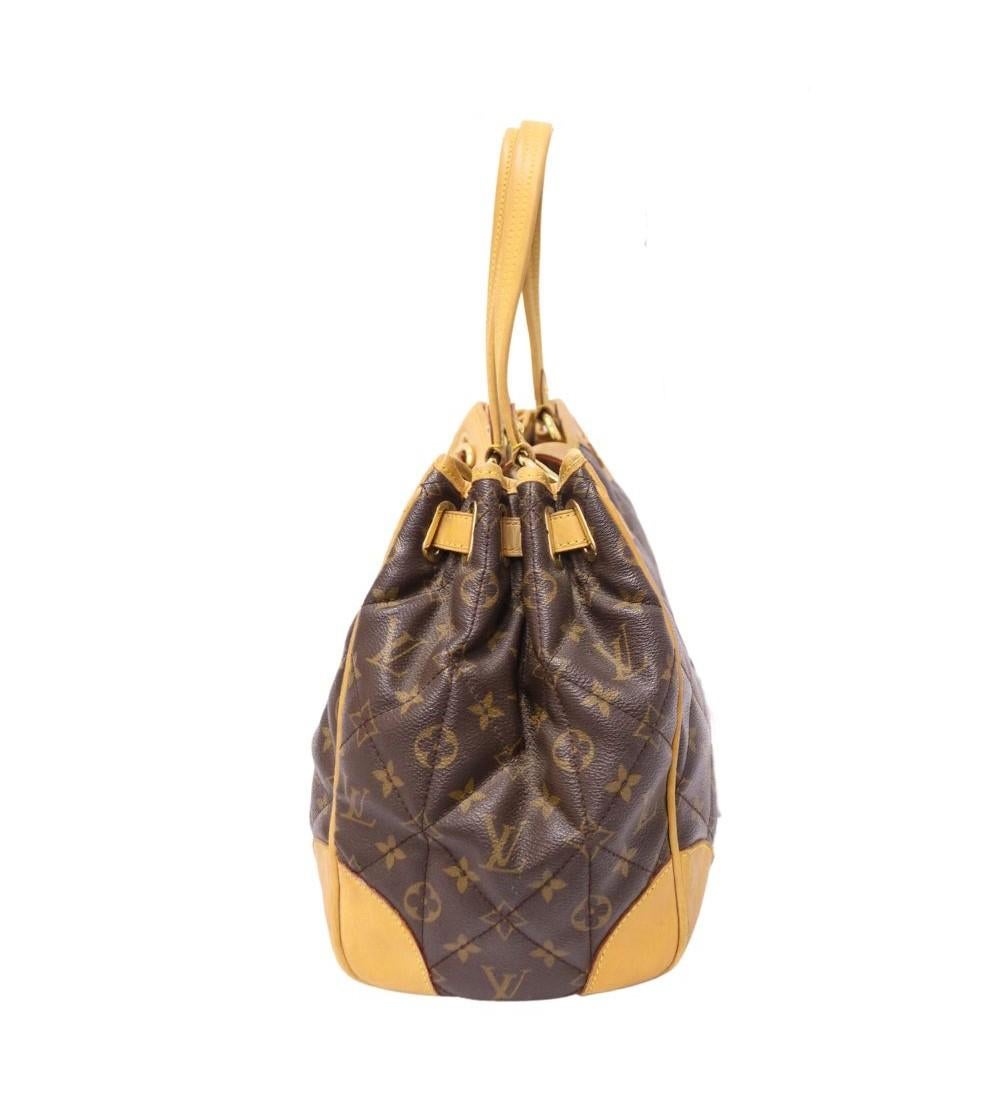 Louis Vuitton Monogram Canvas Etoile Shopper Bag, mit zwei Ledergriffen für die Schulter, Druckverschluss und einem Innenfach.

MATERIAL: Leder
Hardware: Gold
Höhe: 26cm
Breite: 40cm
Tiefe: 17cm
Griffabfall: 22cm
Allgemeiner Zustand: