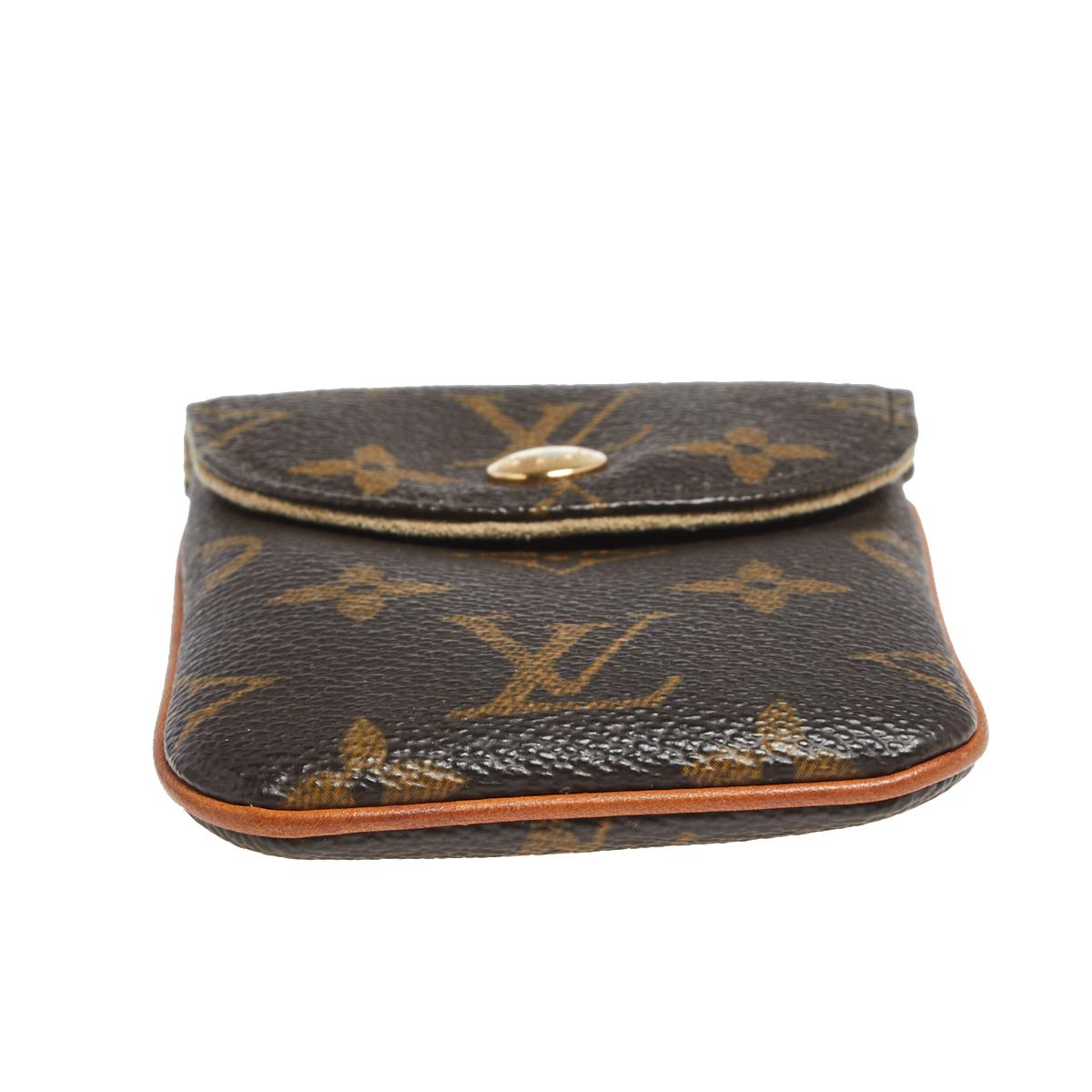 This Etui MM phone case from the House of Louis Vuitton has been designed to keep your phone safe and secured all the time. It is created using Monogram canvas and finished with gold-tone hardware and leather trims. The flap leads us to the