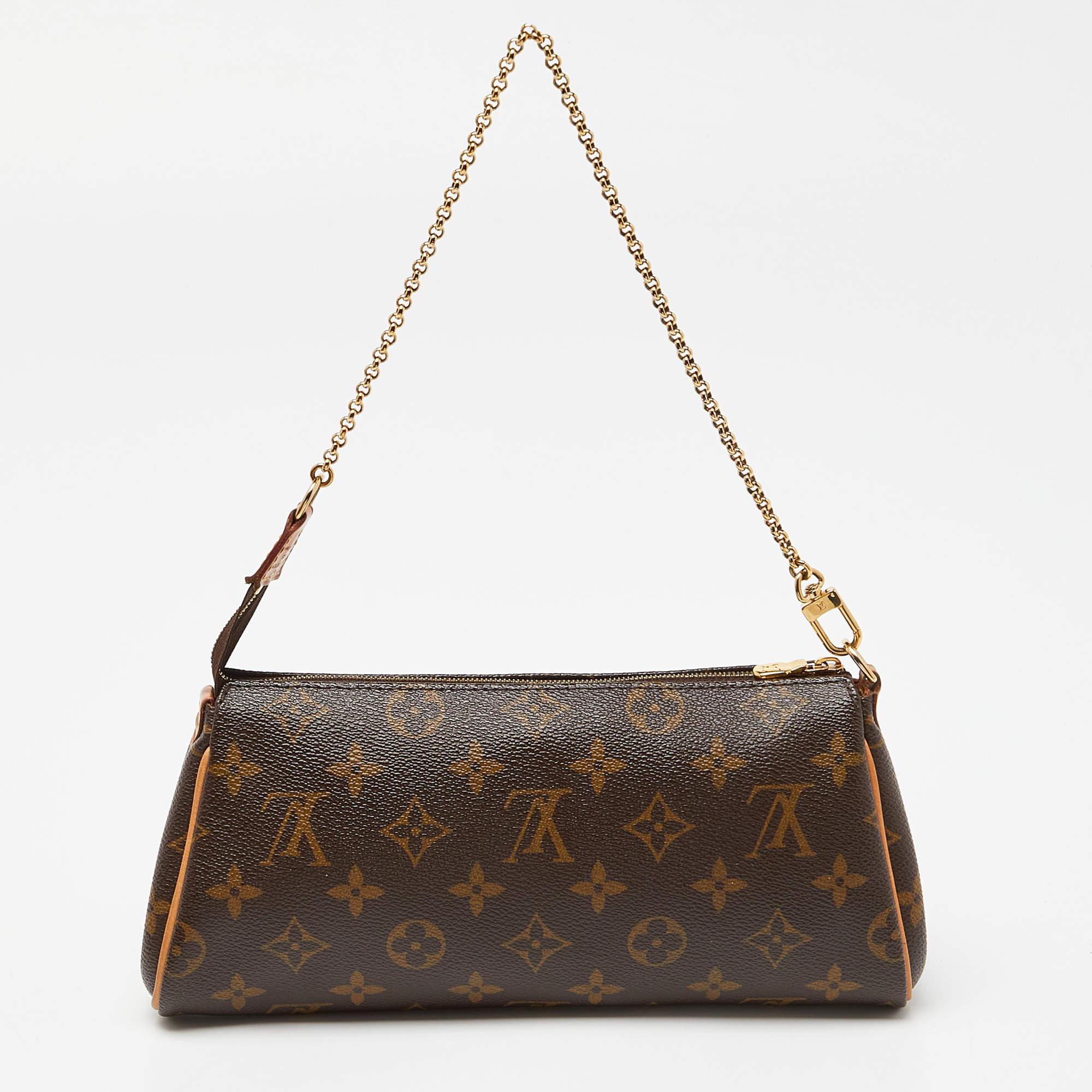 Crafted from Monogram canvas, this Eva Pochette bag is a creation by Louis Vuitton. The bag features a well-sized interior that is secured by a zipper.

Includes: Original Dustbag, Original Box

