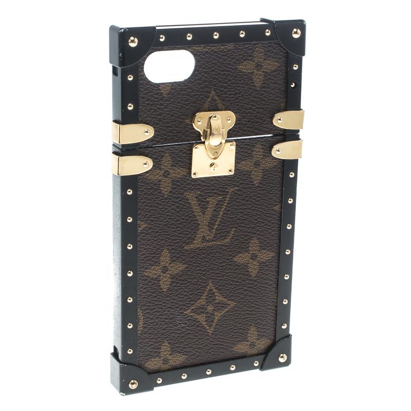 What's not to love about items that are both functional and worthy to be flaunted! To protect that darling iPhone of yours, this stunning Louis Vuitton case has been crafted from coated canvas and styled to resemble their famous trunk designs. The