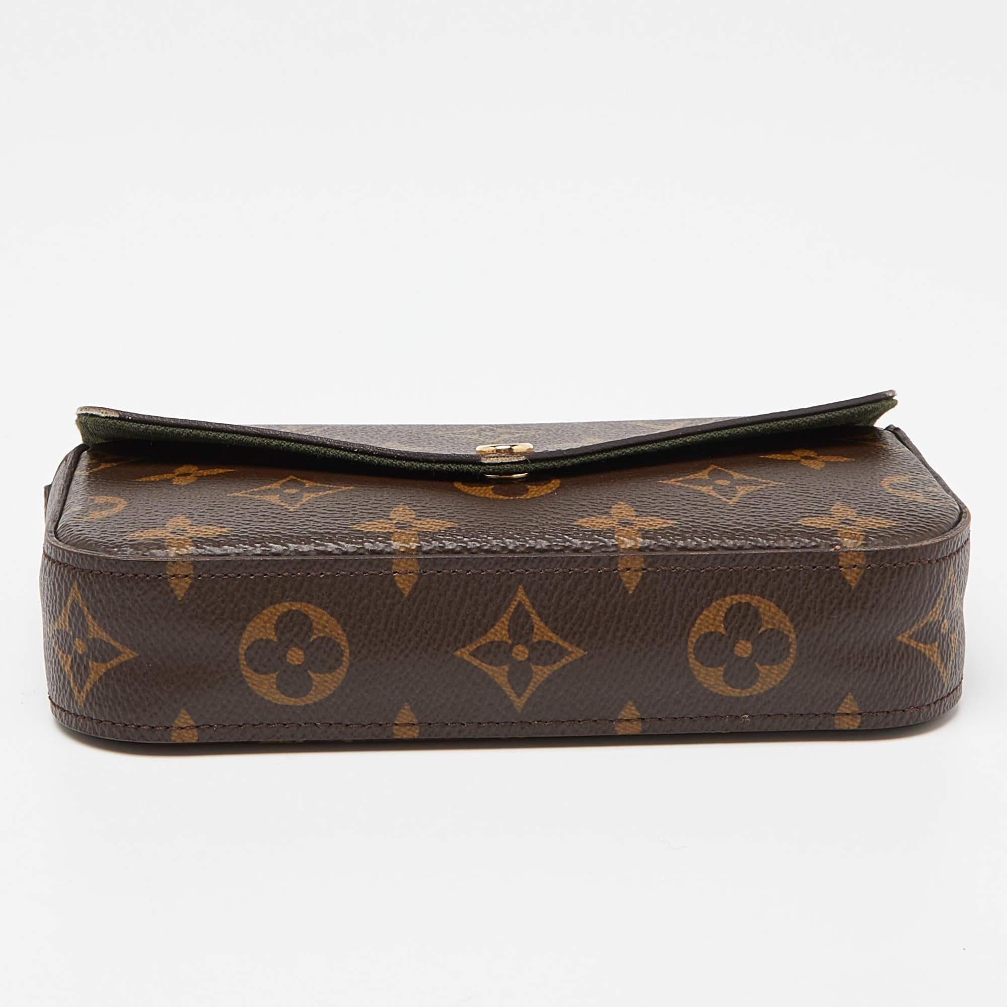 The Louis Vuitton Félicie Strap & Go Pochette has the Félicie Pochette, a jacquard strap, and a removable pouch. The design is crafted from Monogram canvas and gold-tone hardware. It can be carried as a clutch and a shoulder bag.

