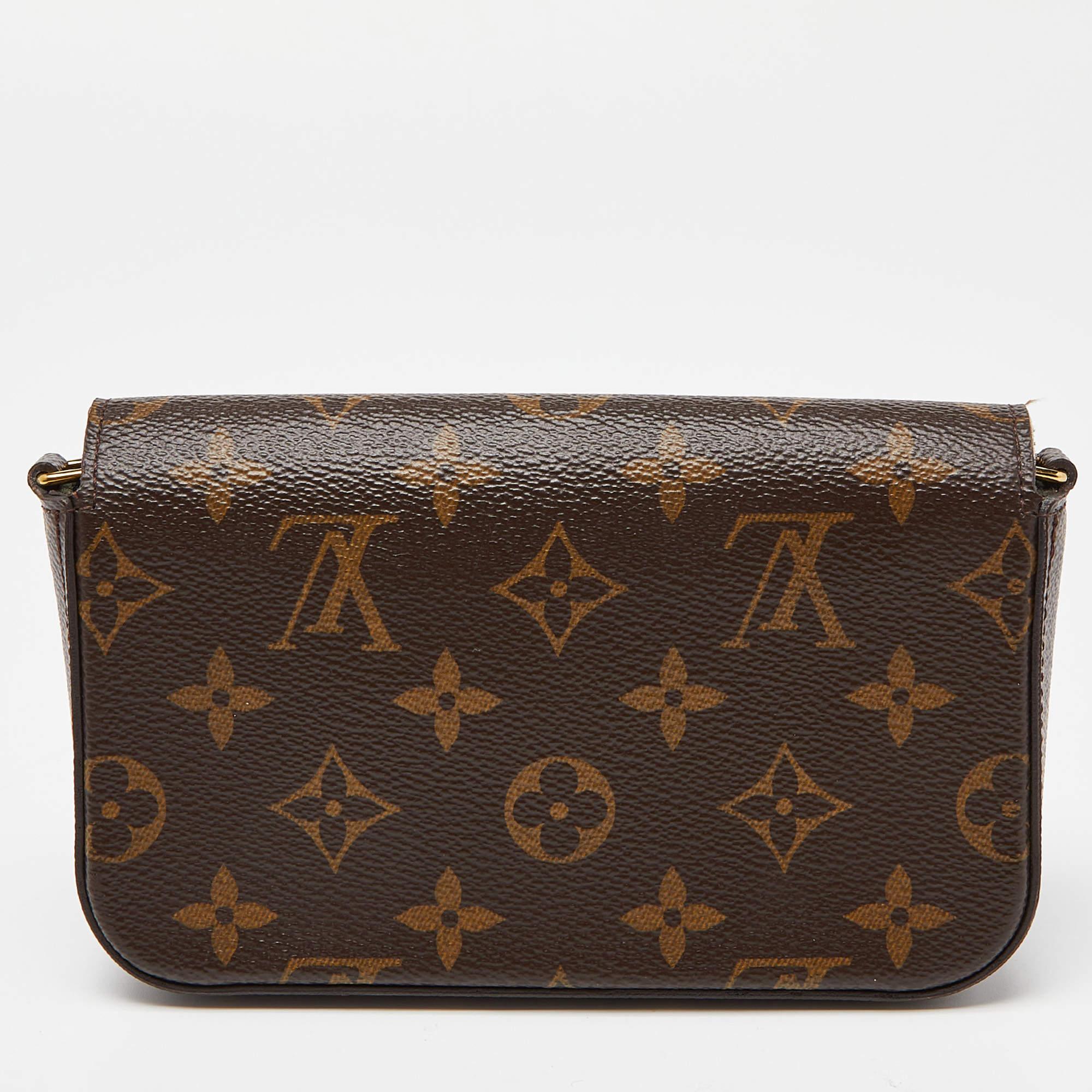 The Louis Vuitton Félicie Strap & Go Pochette has the Félicie Pochette, a jacquard strap, and a removable pouch. The design is crafted from Monogram canvas and gold-tone hardware. It can be carried as a clutch and a shoulder bag.

Includes: Original