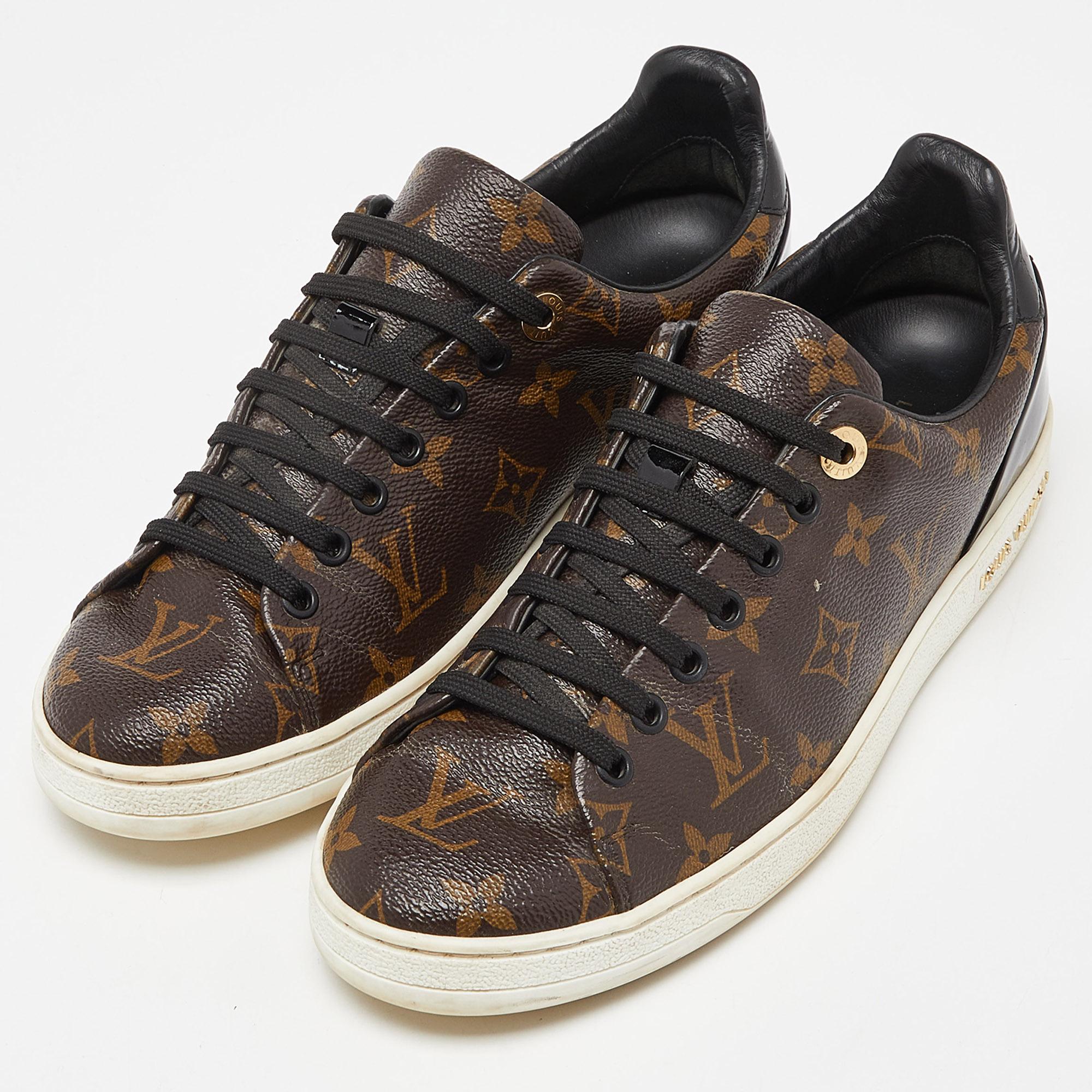 These Frontrow sneakers from Louis Vuitton are all you need to add an extra edge to your outfit. This pair has been crafted from monogram canvas and styled with round toes, lace-ups and gold-tone logo details on the midsoles. Balanced on rubber