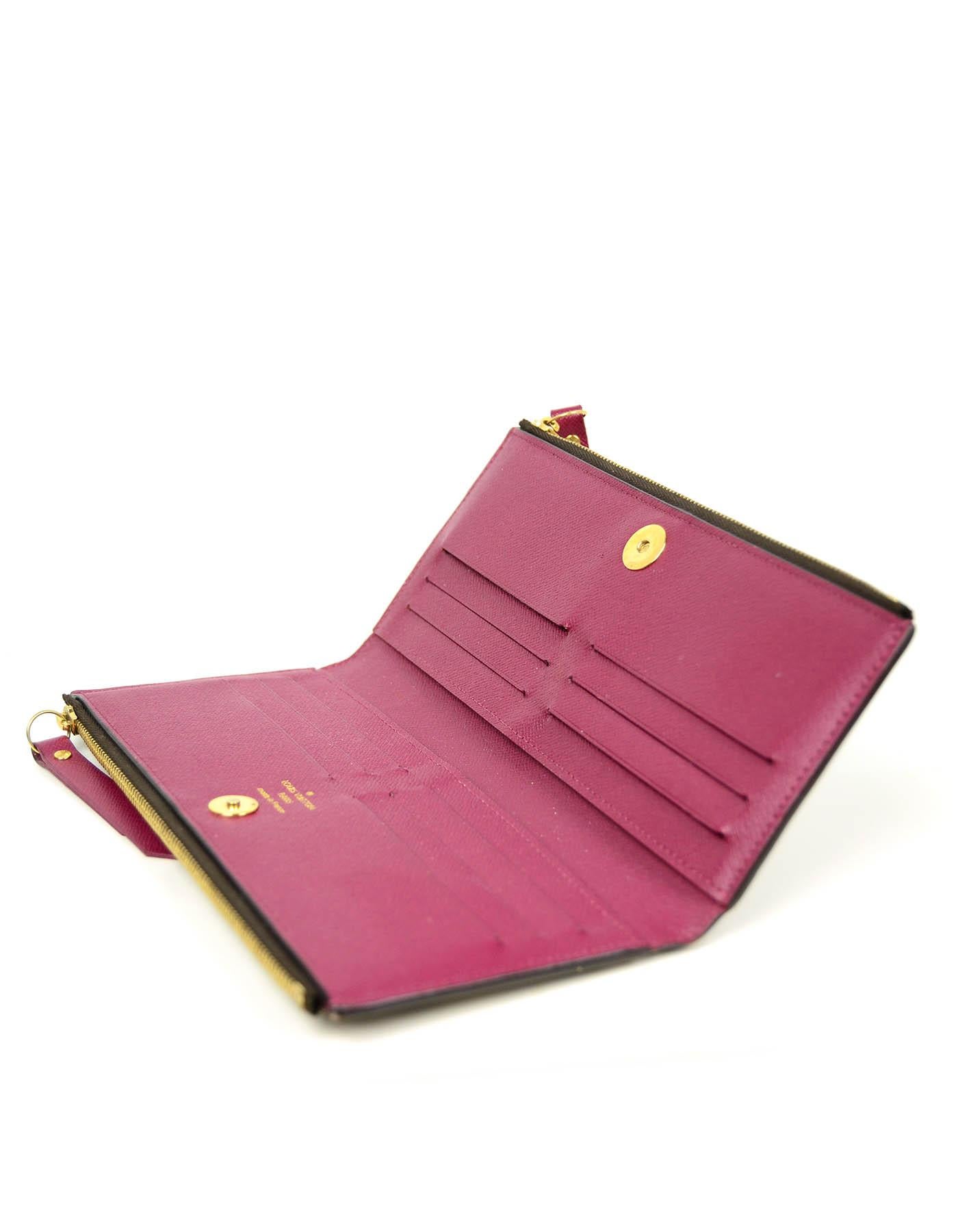 Louis Vuitton Monogram Canvas Fuchsia Adele Wallet

Made in: Frankreich
Produktionsjahr: 2015
Farbe: Braun mit fuchsiafarbener Verzierung
Hardware: Goldtone
Materialien: Monogram beschichtete Leinwand:: Leder
Futter: Fuchsiafarbenes