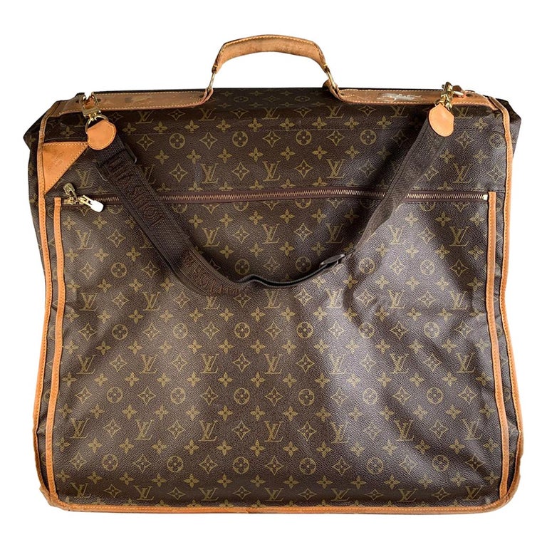 Louis VUITTON. Travel cover for clothes in monogrammed c…