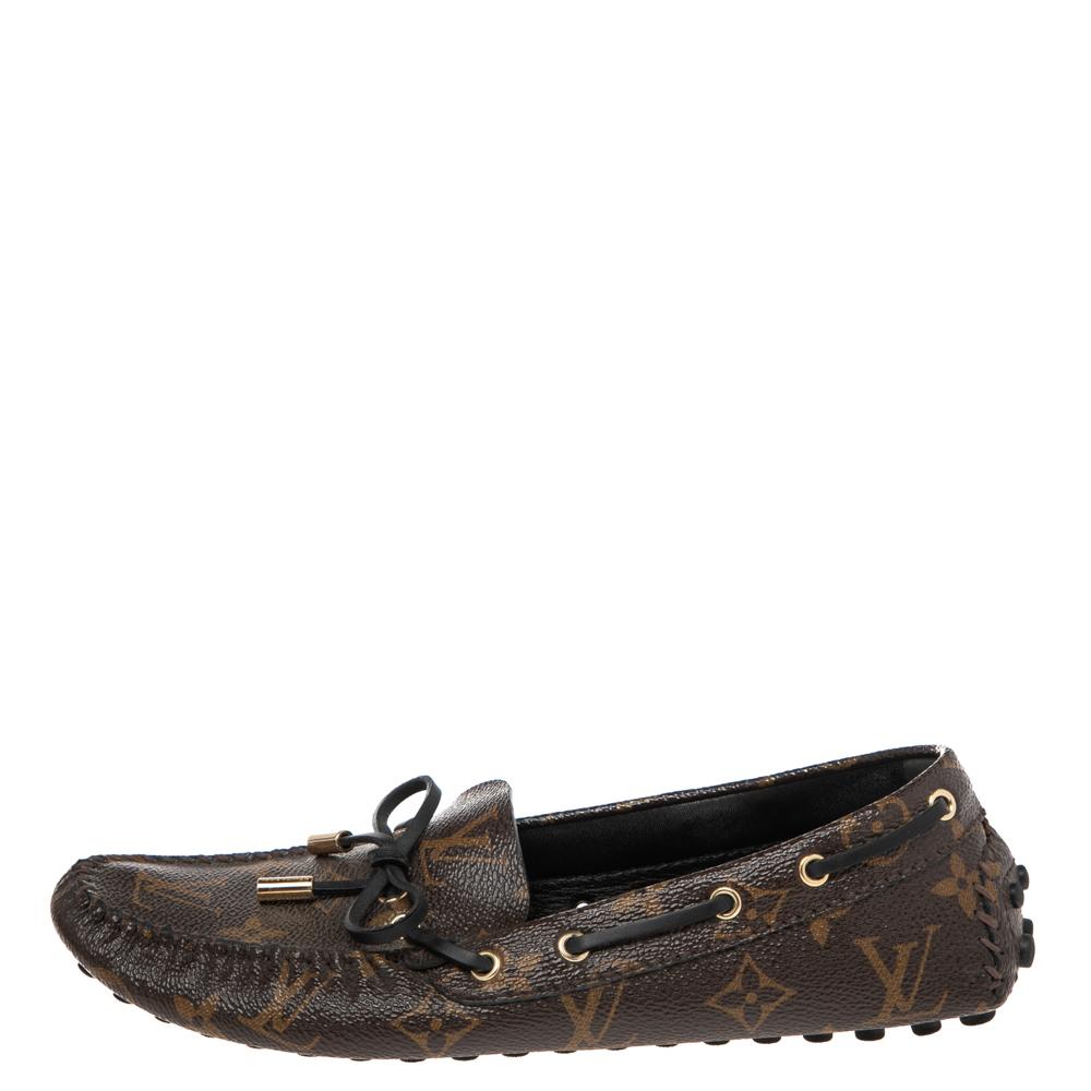 To perfectly complement your attires, Louis Vuitton brings you this pair of loafers that speak of effortless style. The shoes are crafted from monogram canvas and styled with ties on the uppers. The comfortable loafers are easy to slip on and they