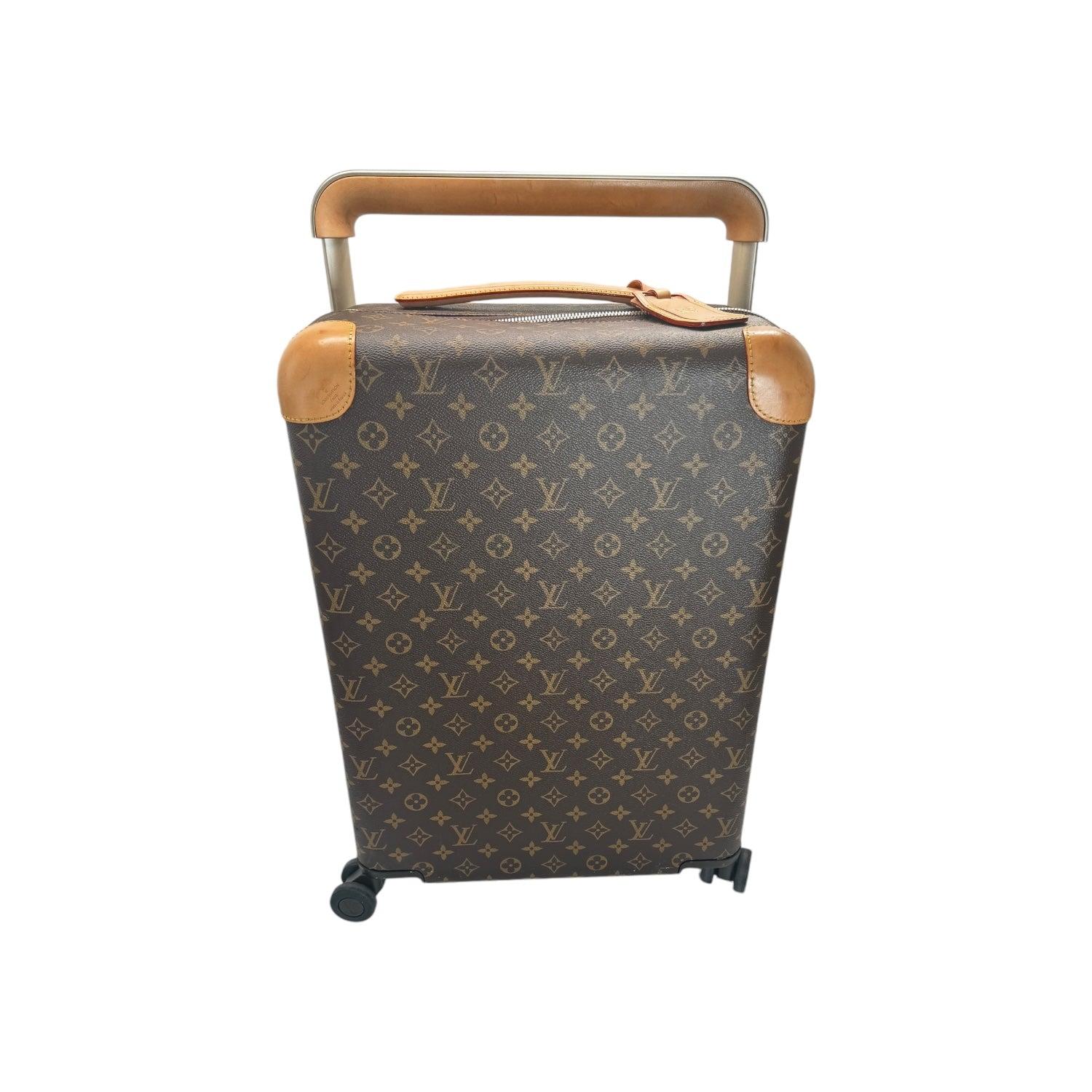 Take your travels to the next level with the Louis Vuitton Monogram Horizon 55. Crafted with durable Brown Monogram Coated Canvas and aluminum metallic pieces, this luggage offers 37 liters of storage and a TSA lock system for added security. The