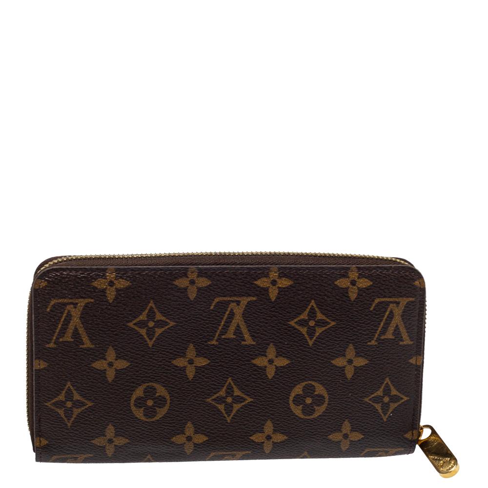This limited edition wallet by Louis Vuitton is a work of art and is also highly practical. Crafted from Monogram canvas, the exterior is adorned with an illustration of the label's advertisement back in the early 90s accented with vibrant hues. The