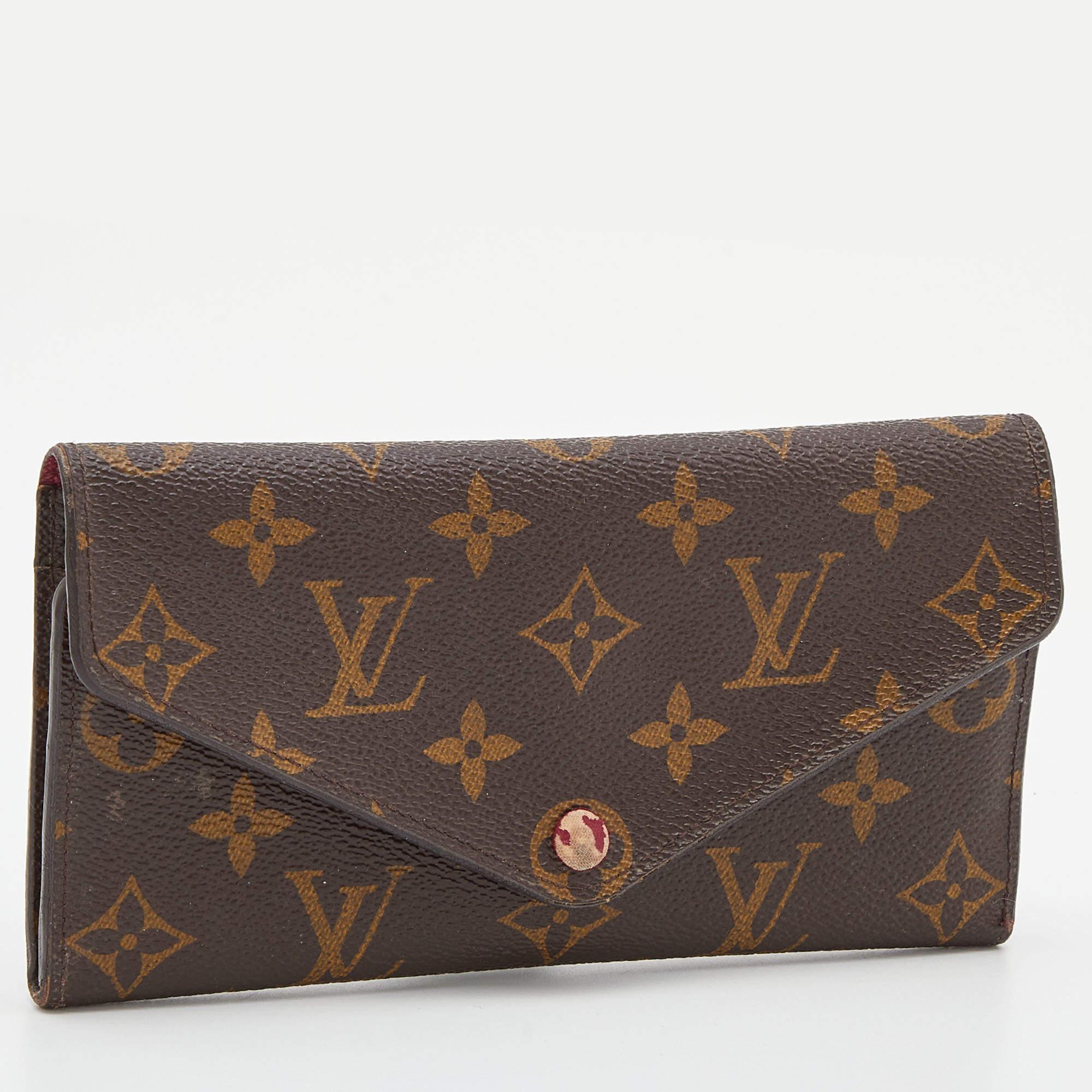 Louis Vuitton never fails to impress us and yet again charms us with this lovely Josephine wallet. It is crafted from Monogram canvas and features a front flap button closure. It opens to reveal a leather-lined interior that is equipped with